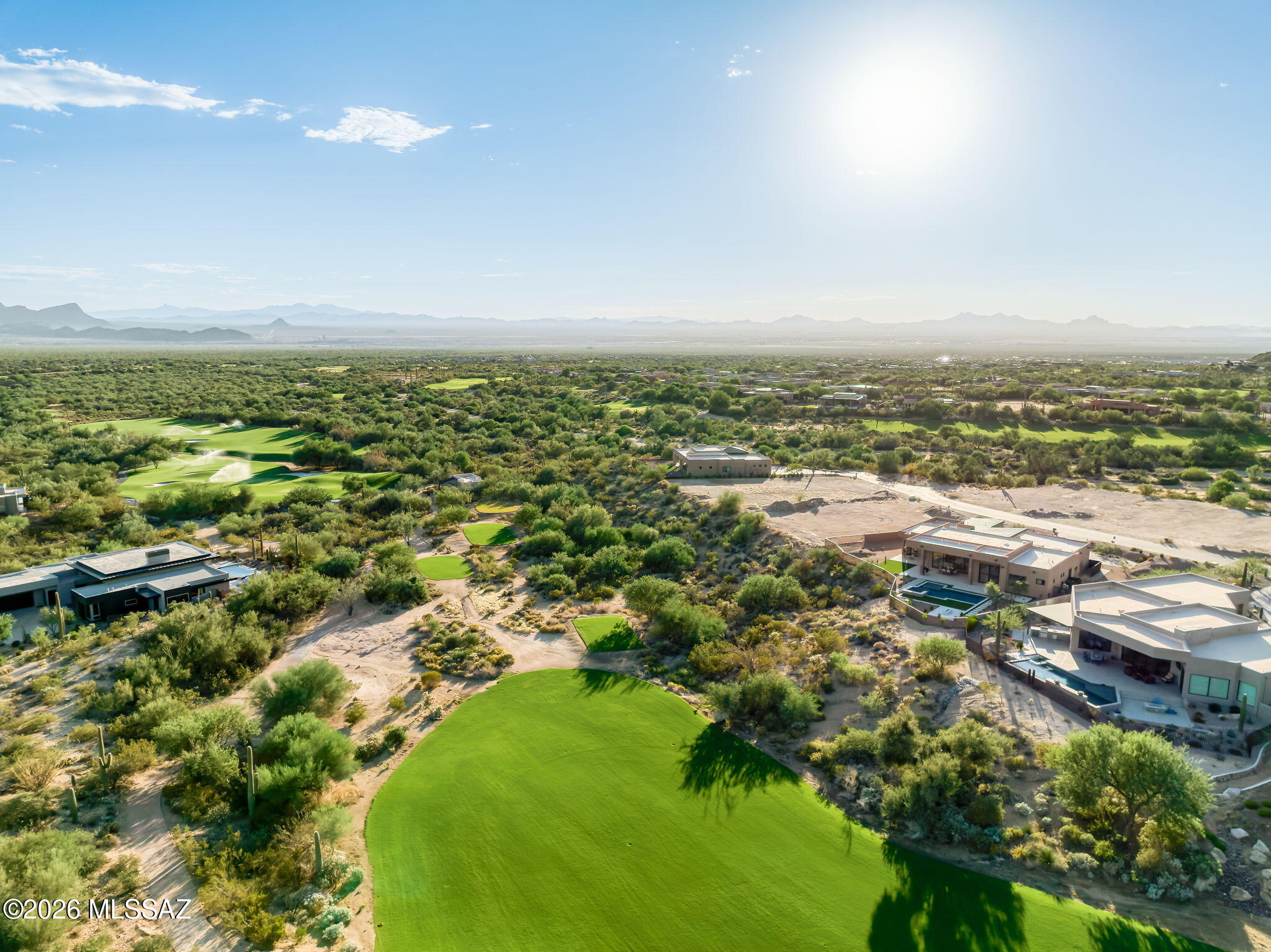 Claim one of the last homesites in The Overlook, the double-gated custom-home enclave at the heart of Dove Mountain. Set among contemporary desert residences with strong mountain and desert views, this graded, build-ready lot lets you skip the cost and timeline of major site work and go straight to designing your home. Select from custom plans with plenty of options and generous covered outdoor living, or go fully custom with your own architect and builder. Live minutes from the Ritz-Carlton, resort dining, Jack Nicklaus golf, and The Gallery's championship courses, with Gallery Sports Club amenities and 50+ miles of hiking and biking trails. Icon 63 membership eligibility provides access to 63 holes of golf.