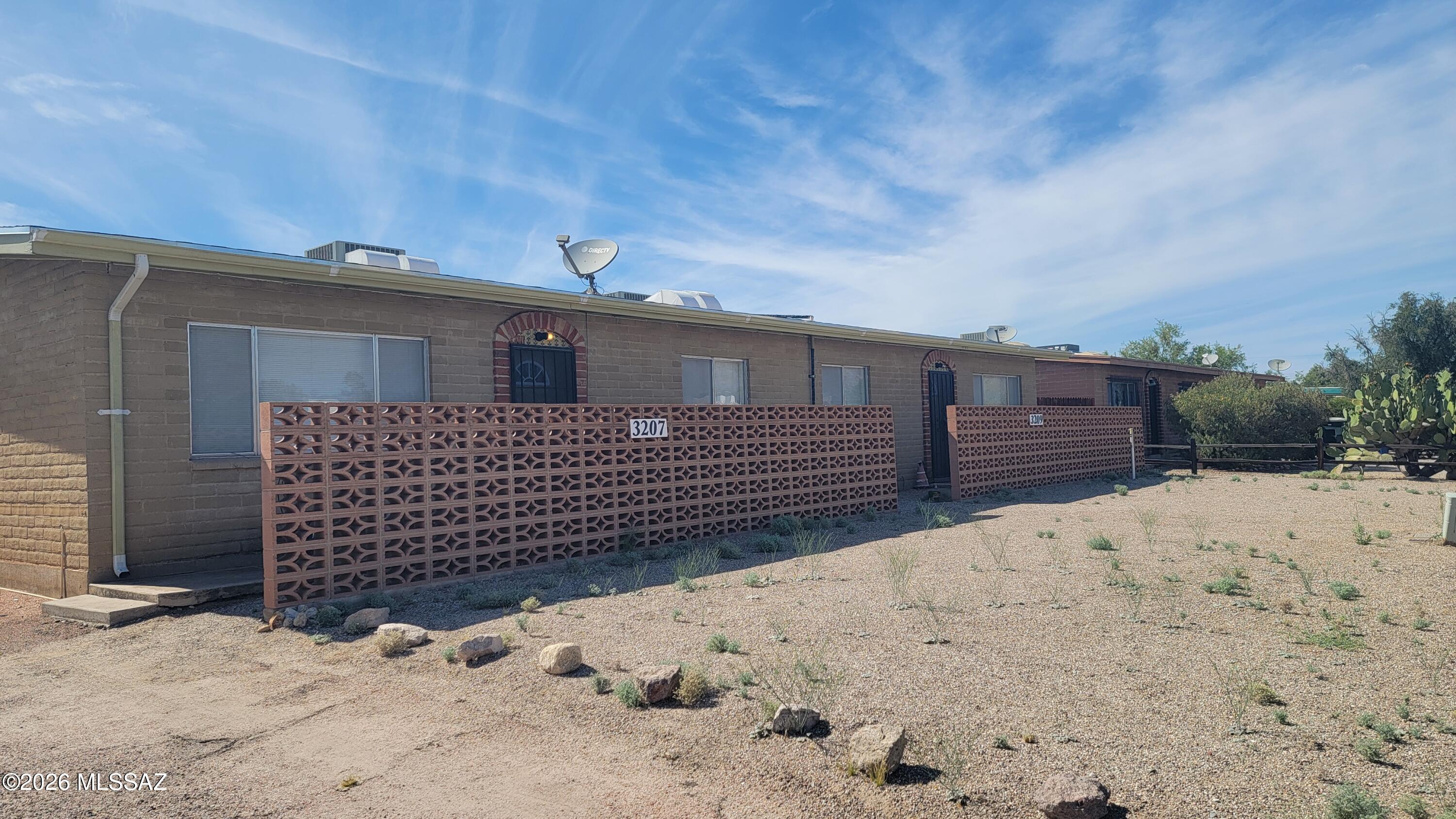 Fabulous Investment Potential. 2 Bedroom 1 Bath Triplex ready for updating. 3 Units each have 3 separate Electric meters, 2 Water meters and separate 3  Gas meters. Each has their own Central AC Units PLUS individual carports that have large storage closets for 3 separate washer and dryer hookups. This fixer-upper has great location renting potential.
