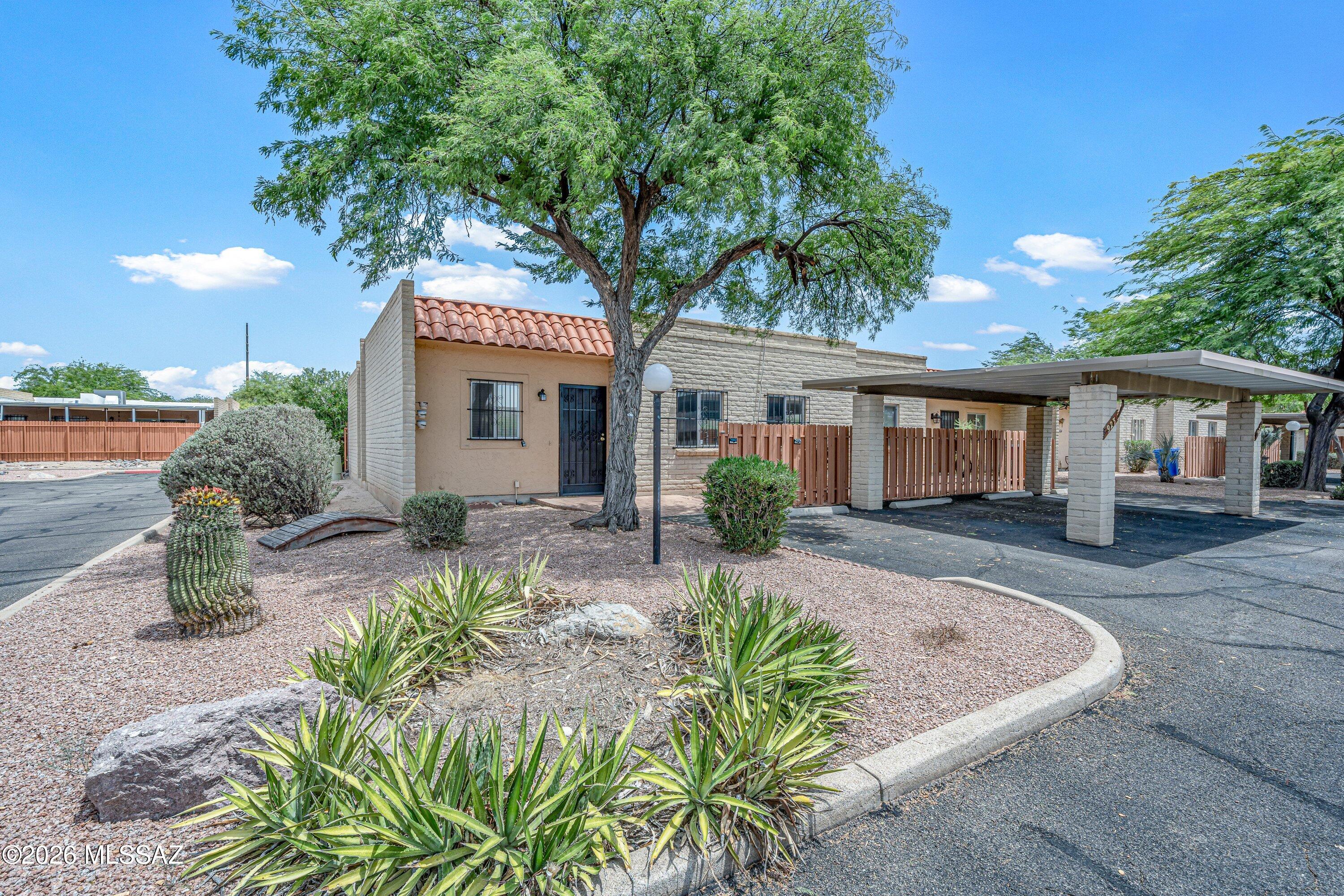 Welcome to easy Tucson living! This well-maintained 3-bedroom, 2-bath townhome offers 1,269 square feet of comfortable living in a convenient eastside location near 22nd Street and Pantano Road. Backing to the community wash with direct access to Tucson's renowned Loop bike path, this home is perfect for anyone who enjoys walking, biking, or simply relaxing with a little extra privacy. Inside, you'll find thoughtful updates throughout, including no popcorn ceilings, newer Hunter Douglas ceiling fans, skylights that fill the home with natural light, newer blinds, a new microwave, and a spacious walk-in pantry. The washer and dryer are conveniently located inside the home, making everyday living even easier. Step outside to your private paved backyard, complete with gutters and additional exterior storage--ideal for entertaining, gardening, or enjoying Arizona's beautiful weather. Major improvements provide added peace of mind, including an HVAC system approximately six years old and a roof that was recoated around six years ago. Conveniently located just minutes from Davis-Monthan Air Force Base, Park Place Mall, Skate Country, and local favorites like Viro's Italian Bakery, you'll also enjoy quick access to shopping, dining, and recreation. Whether you're searching for your first home, looking to downsize, or adding to your investment portfolio, this East Tucson townhome is full of opportunity and ready for its next chapter.