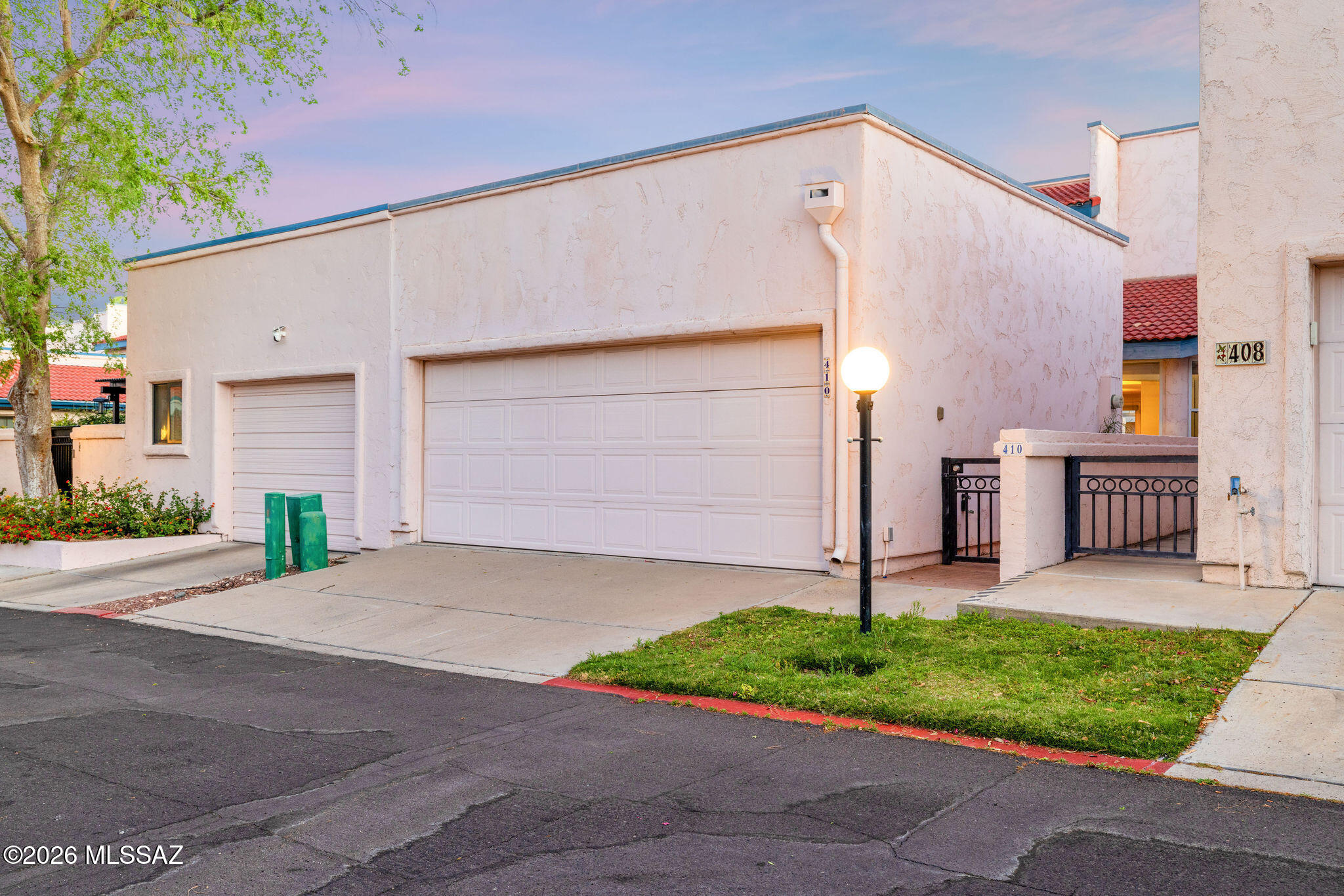 Positioned in the highly coveted Sam Hughes neighborhood, this exceptional townhouse offers a rare opportunity to own the largest residence in the subdivision, blending space, style, and an unbeatable location!

From the moment you arrive, the pride of ownership is undeniable! Inside, an updated kitchen anchors the home with both functionality and modern appeal, seamlessly connecting to inviting living spaces designed for comfort and entertaining. The expansive primary suite serves as a true retreat, offering generous proportions and a sense of privacy rarely found in townhouse living.



Step outside to a charming, thoughtfully designed backyard, perfect for relaxing evenings or intimate gatherings, all complemented by captivating mountain views that add a touch of Tucson's natural Residents enjoy access to a community pool, while the location itself is simply unmatched--walk or bike to the University of Arizona, La Rosa, Reid Park, scenic walking paths, and downtown Tucson's vibrant dining and entertainment scene!



Quite simply, opportunities like this are few and far between. Location, lifestyle, and livability converge here in one of Tucson's most desirable enclaves!