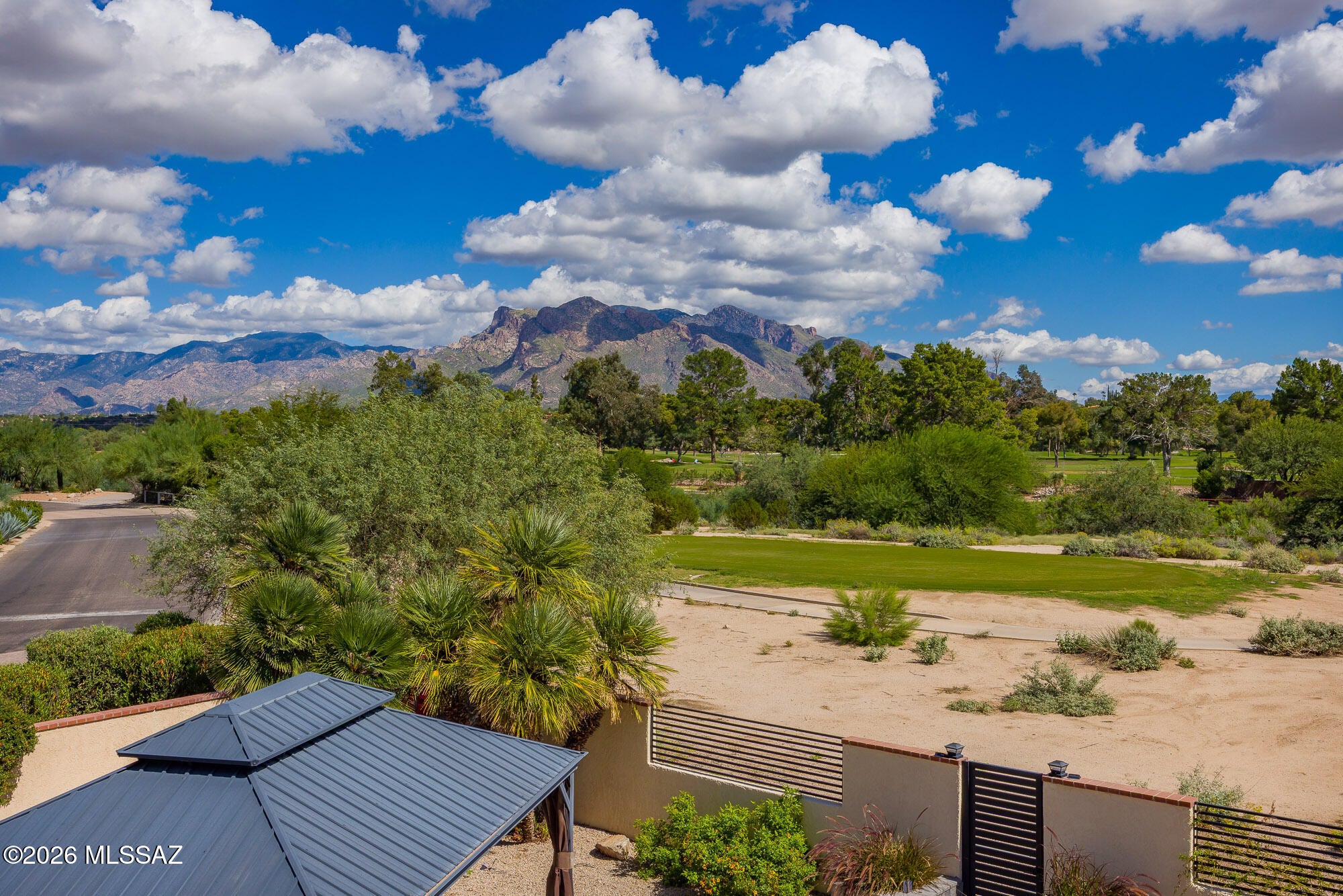 Views! Views!  Don't miss this stunning, updated 3-bedroom, 3-bath home + heated and cooled workspace/ hobby room.  Marvel at unobstructed Catalina Mountain Views. Tucson National at the OMNI, golf course lot on -6th t-box.
 Soaring 18-foot ceilings and an open spacious floor plan set the stage for
effortless indoor and outdoor entertaining.
Designer touches throughout. Gourmet kitchen outfitted with superior appliances, granite, six burner gas cooktop and all custom cabinetry. 
Energy efficient with newer mechanicals, zoned heating and cooling, 2019 dual pane, Low-E windows and sliders.
Low maintenance and beautifully landscaped on a double lot. All custom work.  
Primary Suite isvon the main floor.  
Live the resort lifestyle.  Pool, restaurants and so much more, 
Owner/Agent See attached upgrade list as there are too many to list.
Owner/Agent
