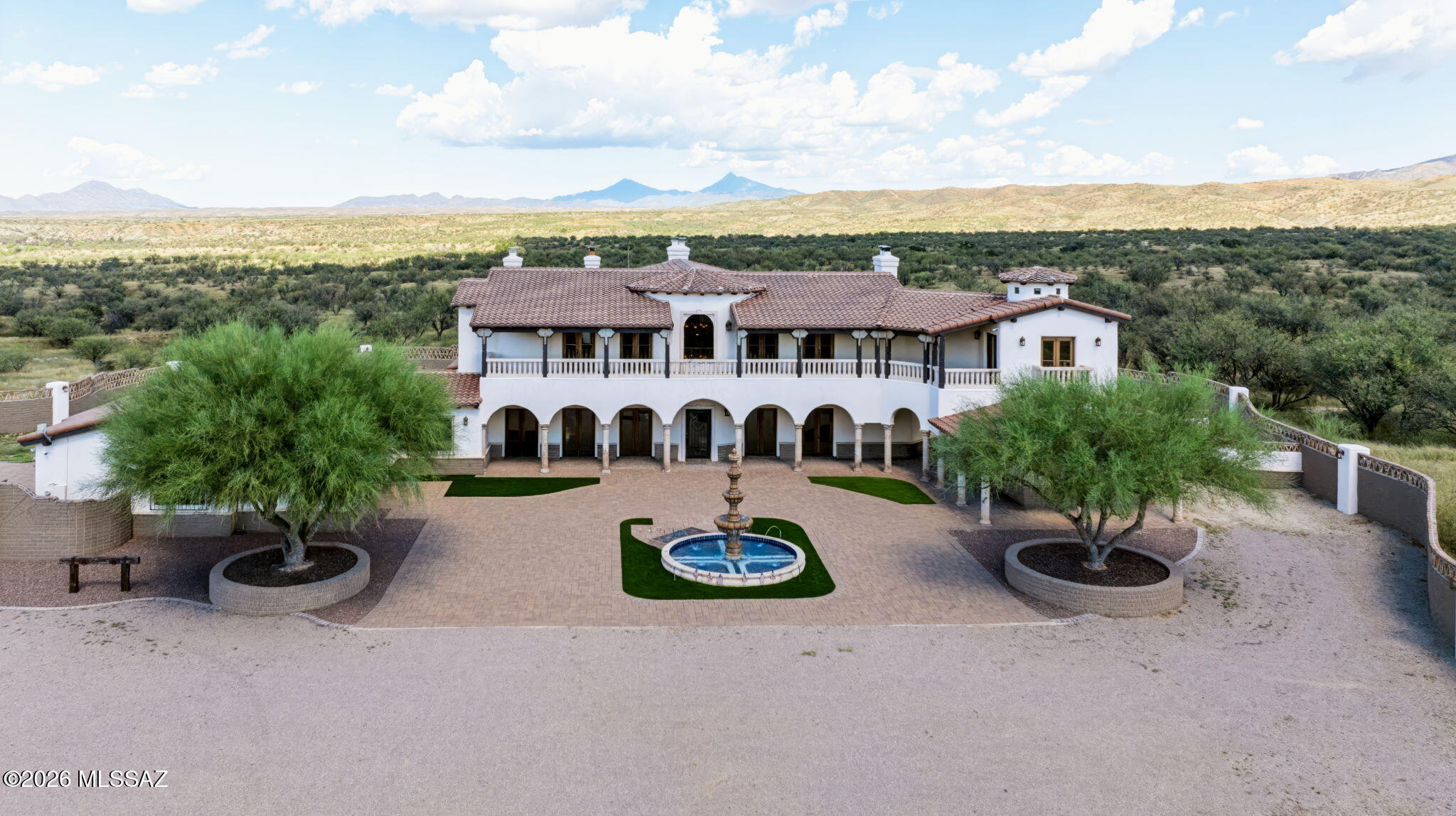 Old world charm meets modern amenities with this 6,869 square foot 6 bedroom/5.5 bath home nestled in the rolling foothills of Kino Springs in Santa Cruz County. This completely walled estate provides all the privacy you would expect for this Mission Style home as the center piece of your own 36 acre estate. Cathedral Ceilings with massive light fixtures, a movie Theatre, large kitchen and views from the upstairs bedrooms that are unending in all directions.  In addition to these features there is a separate guest house.  Please schedule an appointment to see this truly remarkable Southern Arizona estate home.