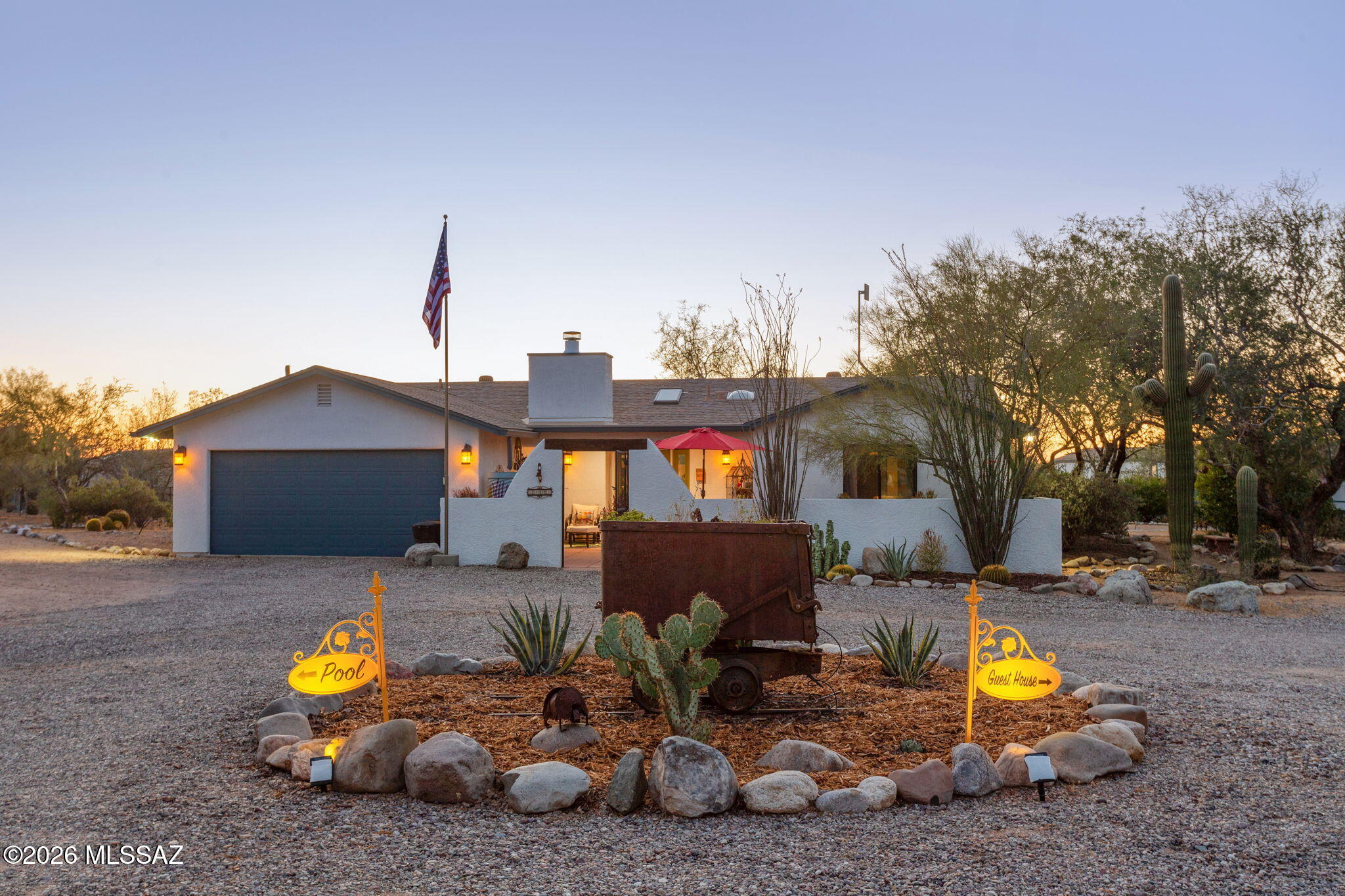 Do not miss this completely reimagined and extensively upgraded hidden desert gem, located near Saguaro National Park! This unique property offers a fully renovated single-family home paired with a remodeled affixed manufactured home- perfect for multigenerational living, rental income, or added flexibility.

With combined renovations totaling more than $450K since 2020, every detail has been thoughtfully upgraded with unmatched charm and character (see full list of improvements under documents). The main residence was gutted and rebuilt in 2021, featuring a new layout, all-new windows, doors, tile flooring, a stunning modern kitchen and bathrooms, skylights and solar tubes, a new HVAC, and a 400-amp electrical panel. Additional upgrades include fresh interior/exterior paint, new baseboards, and a beautifully updated fireplace.

Outdoor living shines in this oasis, featuring a recently added pool, security fencing, a screened-in porch, and professionally landscaped grounds. Owned solar panels and an automatic gate opener add efficiency and convenience.

The affixed manufactured home has also been thoughtfully updated, offering new luxury vinyl flooring, refreshed kitchen and baths, updated plumbing, and its own private outdoor space with an enclosed yard- making it an ideal guest house or income-producing unit. 

There is no shortage of storage with multiple sheds (all with electricity), including a detached workshop that comfortably fits an additional vehicle. Don't miss the full RV hookups and multiple animal pens. A rare opportunity to own a turn-key property with extensive upgrades and versatile living options. A must-see in order to fully appreciate- schedule an appointment today!