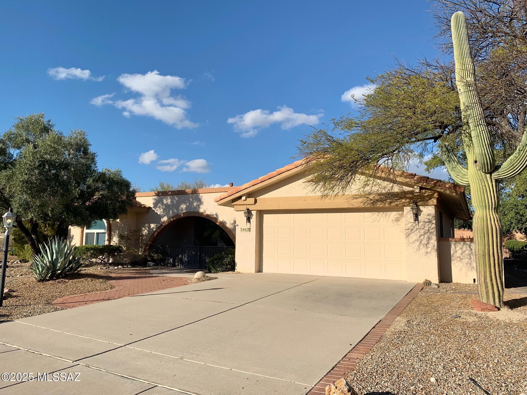 Charming 1,524 sq. ft. 2 bed/2 bath with office located in the highly desired 55+ community of Sun City in Oro Valley. Scenic mountain views. Welcoming courtyard patio. Bay windows in primary bedroom and dining area. Soaking tub in hall bathroom. Ceiling fans throughout. Garage with utility sink and plenty of storage cabinets. Large backyard with mature and lush landscaping. Covered backyard patio. Enjoy the numerous activities that Sun City has to offer such as golf, tennis, pool, fitness center and clubhouse. Make this your home today!