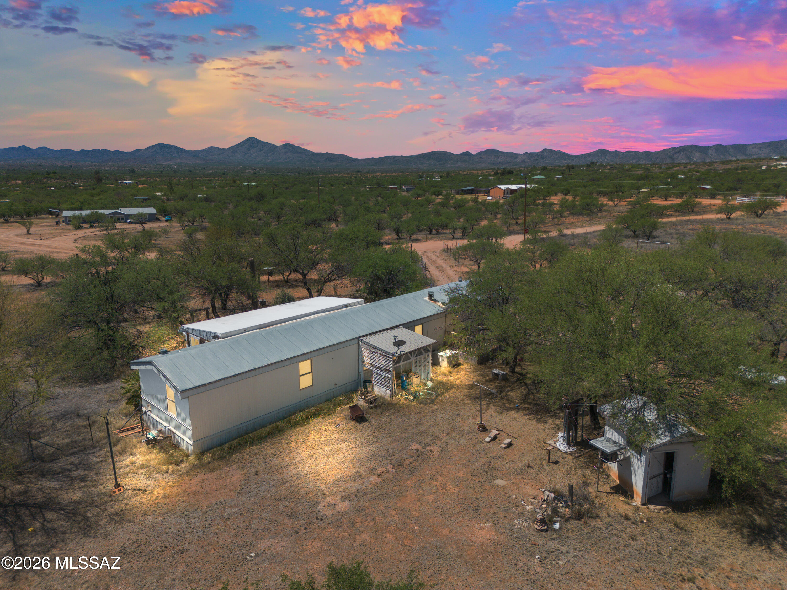 3 bedroom, 2 bathroom fixer upper on 2.5 acres with a private well! Located in the peace and quiet of Arivaca, this property offers the opportunity to add value from day one. There is a freestanding 3 bay garage/workshop on property along with other detached storage buildings. With no HOA, enjoy all the freedom of country living at a price that won't break the bank!

Cash only.

Square footage is approximate. Buyer to verify.