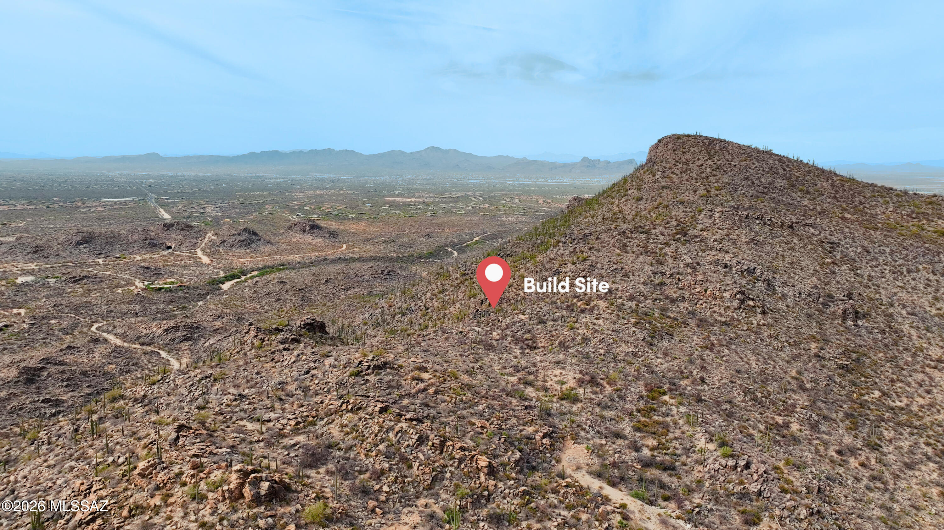 Commanding one of the most striking positions within Saguaro Ranch, Lot 55 showcases the raw beauty and magnitude of the Tortolita Mountains on a grand scale. Elevated and expansive, this estate homesite is surrounded by endless desert, dramatic terrain, and panoramic views that stretch for miles. The sense of space, privacy, and natural power here is unmatched--offering a setting that feels both secluded and extraordinary. Positioned between Dove Mountain and Stone Canyon and accessed through the iconic tunnel entrance, this is a rare opportunity to create a truly one-of-one luxury estate in one of Tucson's most captivating landscapes.