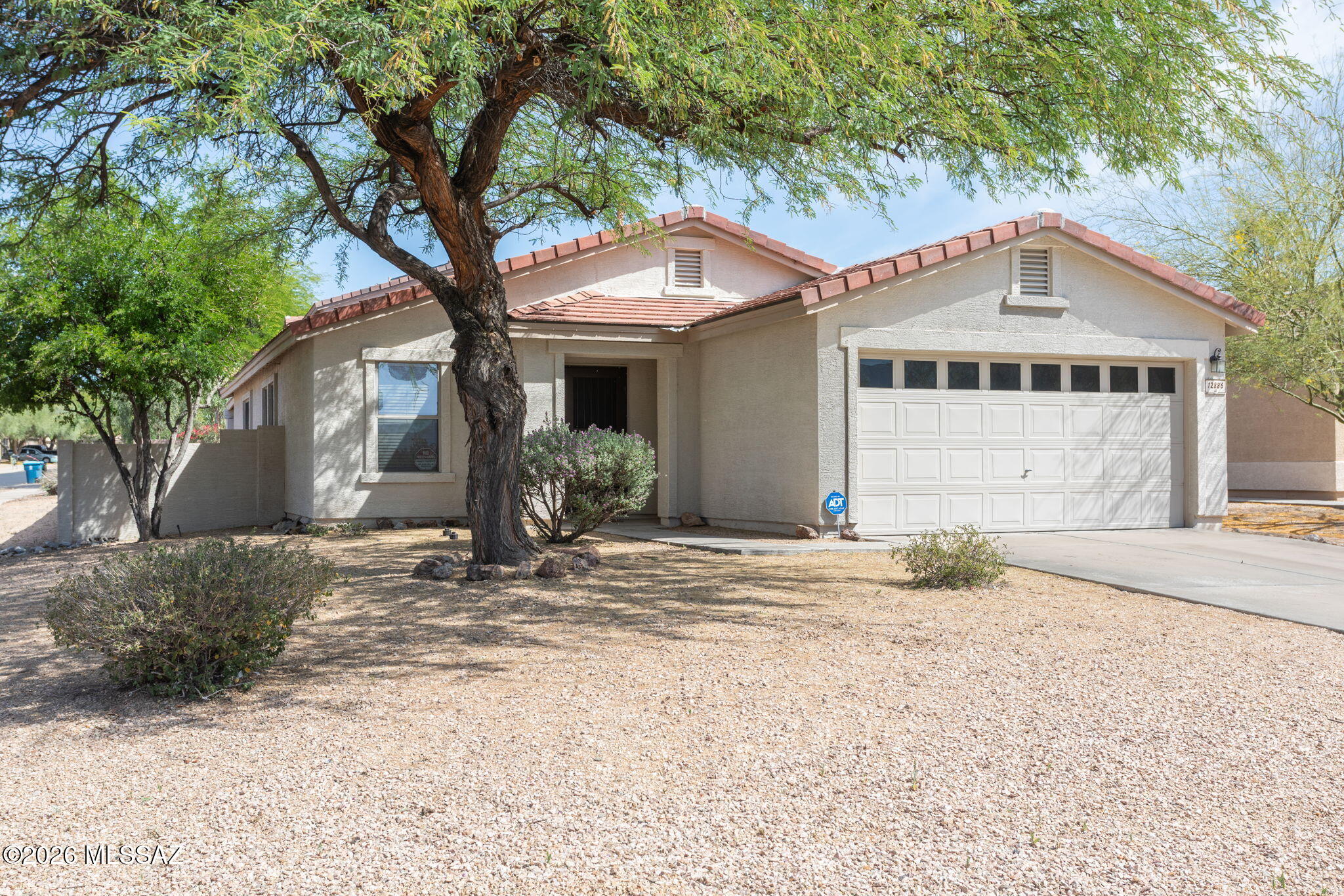 Updated and upgraded move-in ready 3 bedroom/2 bathroom featuring a large open floor plan with plenty of living space. Situated in the highly desirable community of Rancho Vistoso in Oro Valley.  This beautifully positioned home offers the rare advantage of a premium corner lot tucked within a quiet cul-de-sac. The property combines enhanced privacy with added curb appeal, featuring expansive frontage, large backyard, covered patio, updated laminate flooring throughout, brand new roof and just minutes to shopping, parks, scenic trails and top rated schools.