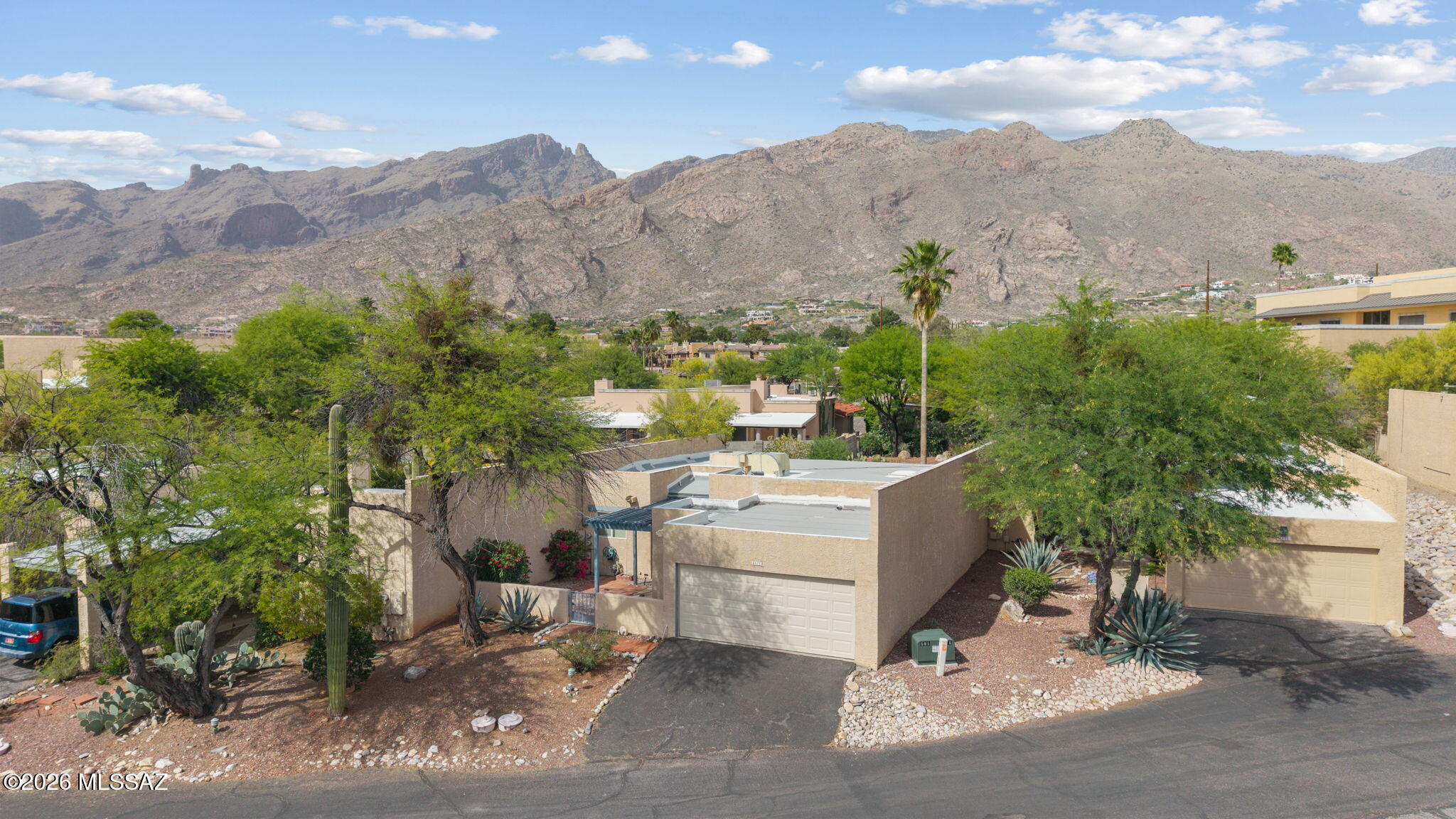 Secluded setting/vegetation all around.  Shaded entrance, solid wood front door ushers you in to a large open space for living, dining and relaxing. Large covered rear patio for entertaining, including in-ground spa. Bright Kitchen.