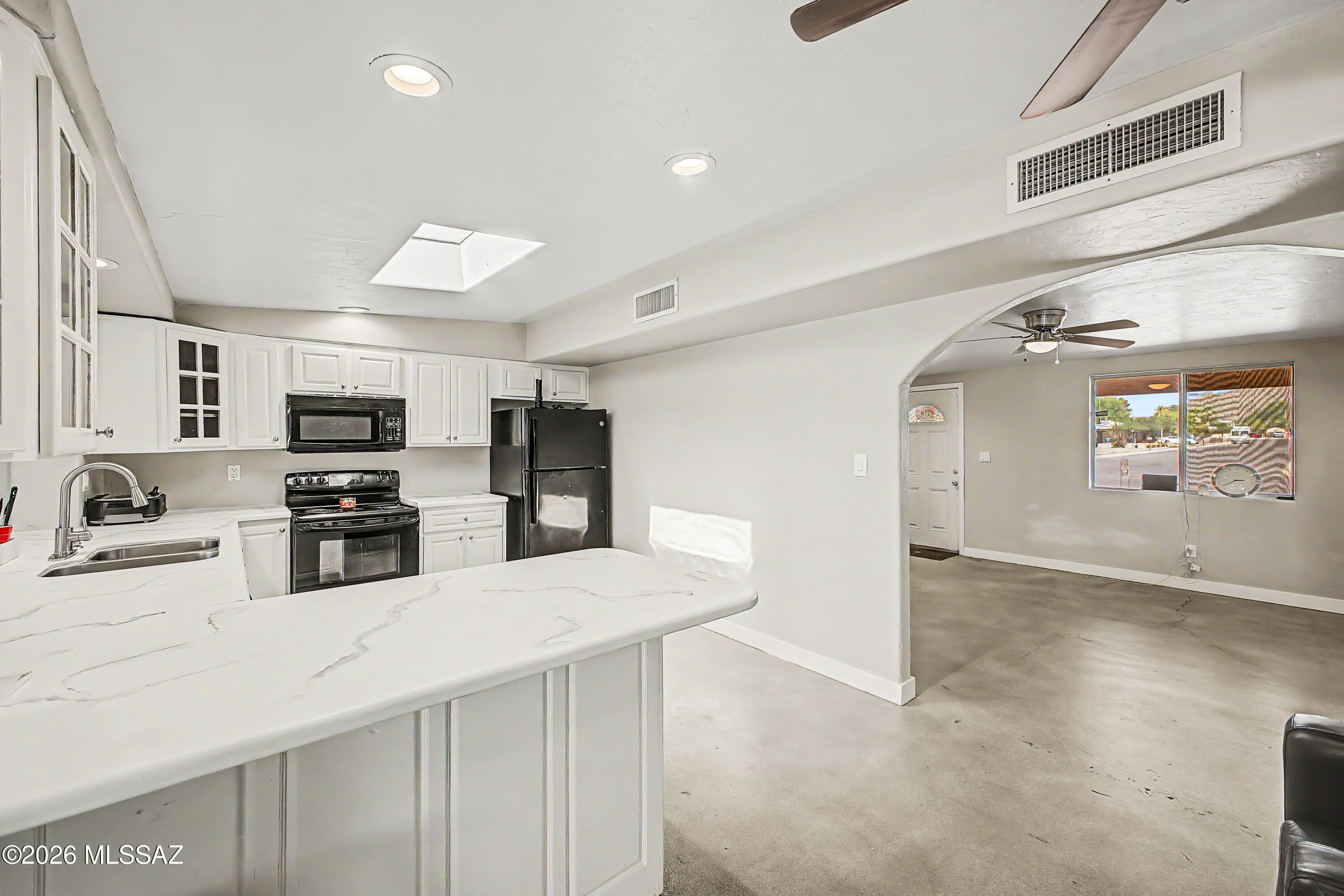 Move-In Ready and thoughtfully updated, this spacious 1,957 sq. ft. home offers the perfect blend of comfort, functionality, and flexibility. Featuring 3 bedrooms and 2 bathrooms, the home showcases an expansive open-concept layout with polished concrete floors, upgraded lighting, neutral designer tones, and generously sized living areas ideal for everyday living and entertaining. The oversized primary suite provides a private retreat, while the beautifully updated bathrooms feature custom tile work, stone countertops, and upgraded fixtures. The spacious kitchen flows seamlessly into the living areas, creating an inviting atmosphere for gatherings. Situated on a large lot with NO HOA, enjoy ample space for RV parking, trailers, recreational vehicles, a workshop, or future expansion. Complete with a storage shed and endless outdoor possibilities, this property delivers the space and freedom today's buyers are looking for. Conveniently located near shopping, dining, schools, parks, and major transportation routes. A rare opportunity offering value, versatility, and room to grow.
