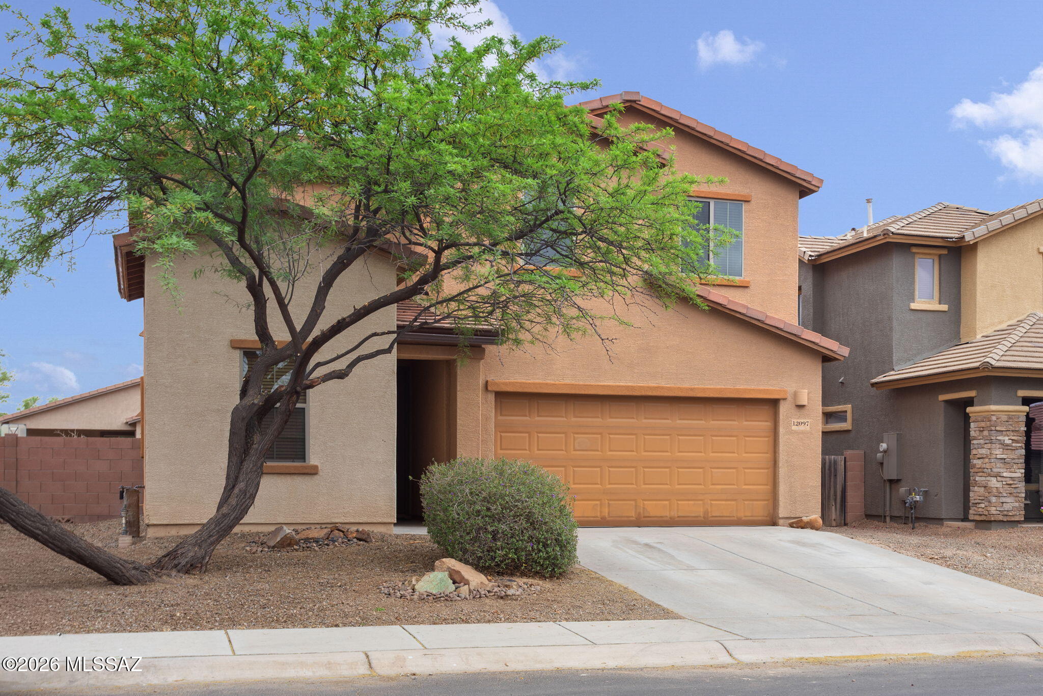 Welcome to this 1,835 sq ft, 4 bd, 3 ba home in the master planned Gladden Farms. Designed for growing households or remote professionals, a flexible layout offers plenty of space for work & relaxation. Enjoy peace of mind with a 2025 roof featuring high-end underlayment & 20-yr warranty, along with 2024 HVAC system. The kitchen features new range & dishwasher (2025), while new interior paint & carpeting create a fresh, move-in ready canvas. Epoxy-coated two-car garage provides excellent storage & water softener to help extend appliance life.  Enjoy the lifestyle this community offers, with Heritage Park just a short walk away featuring open space & fun splash pad. Marana Aquatic Center is less than five minutes away, making this home the perfect blend of convenience, and community living.