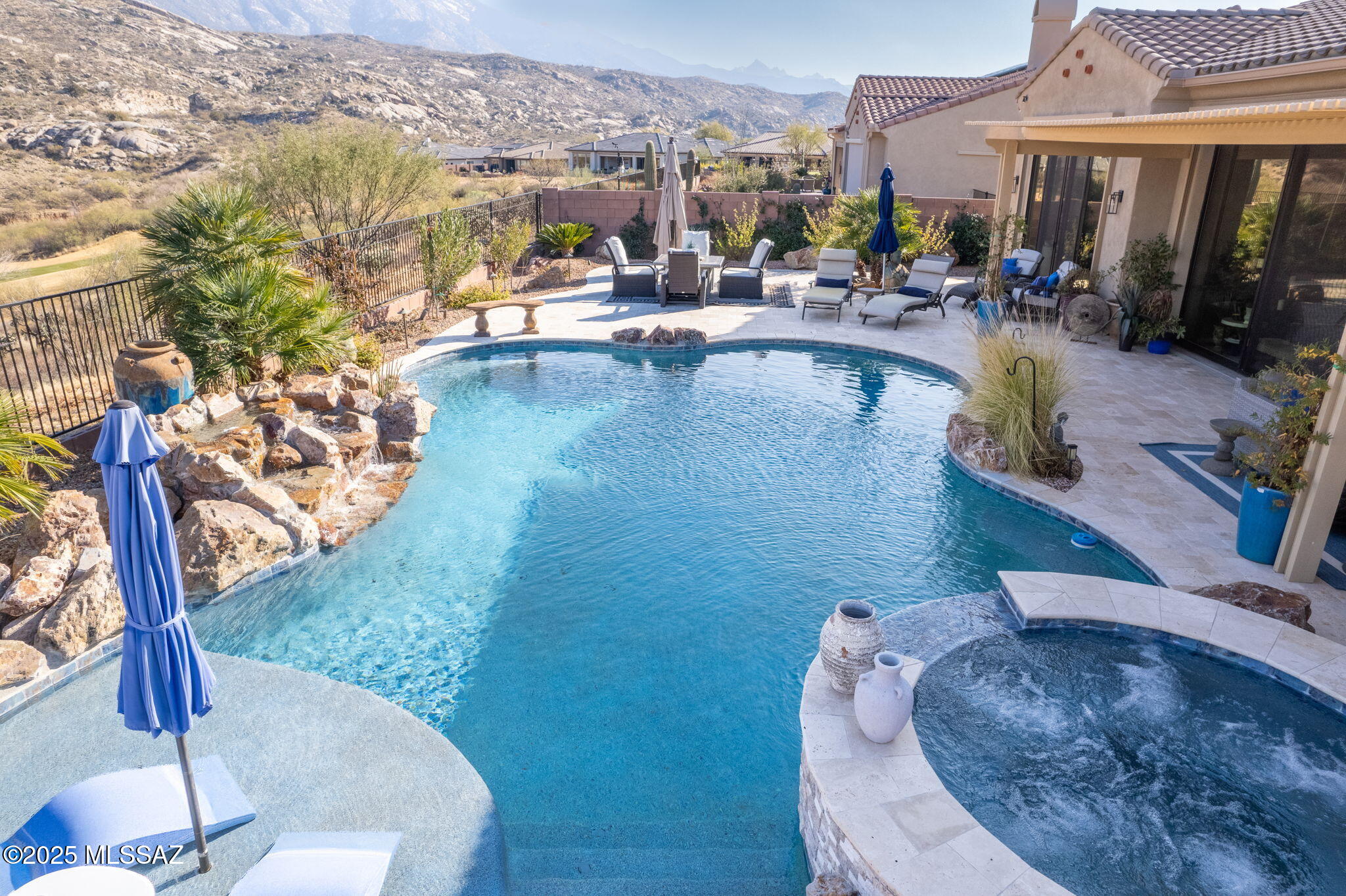 Experience casual elegance in this stunning home located in the Preserve at Saddlebrooke.  Set on a premium golf course lot, this home showcases panoramic views of the Catalina Mtn's.  Open concept FP features 3 ensuite BR, large den, hobby room and powder room. Exquisite finishes & upgrades create a refined yet comfortable ambiance. Expansive AZ room seamlessly blends indoor/outdoor living. Offering dramatic views & resort-style backyard, ideal for entertainment and relaxation. A garden like courtyard welcomes you into an exceptional retreat, where luxury meets the beauty of the Sonoran Desert beyond your private oasis, enjoy world class amenities, including a championship golf course, upscale clubhouse, dining, fitness and endless opportunities for recreation & social engagement