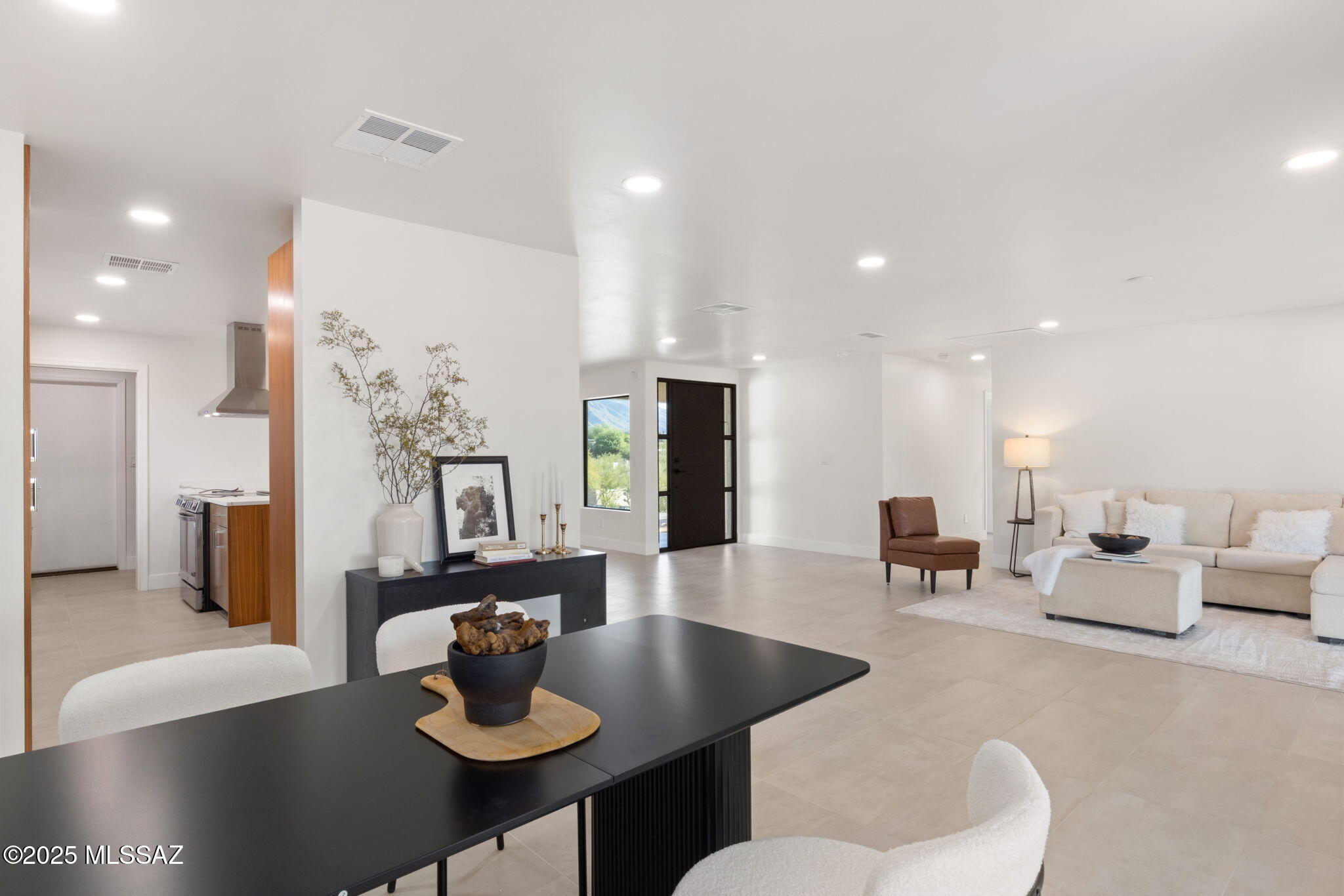 Set high above the city in the Catalina Foothills, this remodeled single-story home delivers what buyers actually want; privacy, natural light, and views that never get old.

The open layout flows effortlessly from kitchen to living space, all oriented to capture the surrounding mountains and city lights. A split-bedroom floorplan adds flexibility for guests, work, or a quiet retreat.

Sitting on over half an acre, the backyard is a blank canvas create the outdoor setup you want while already having the elevation and views dialed in.

Homes at this price point rarely offer this combination of updated interiors, usable land, and true Foothills positioning.