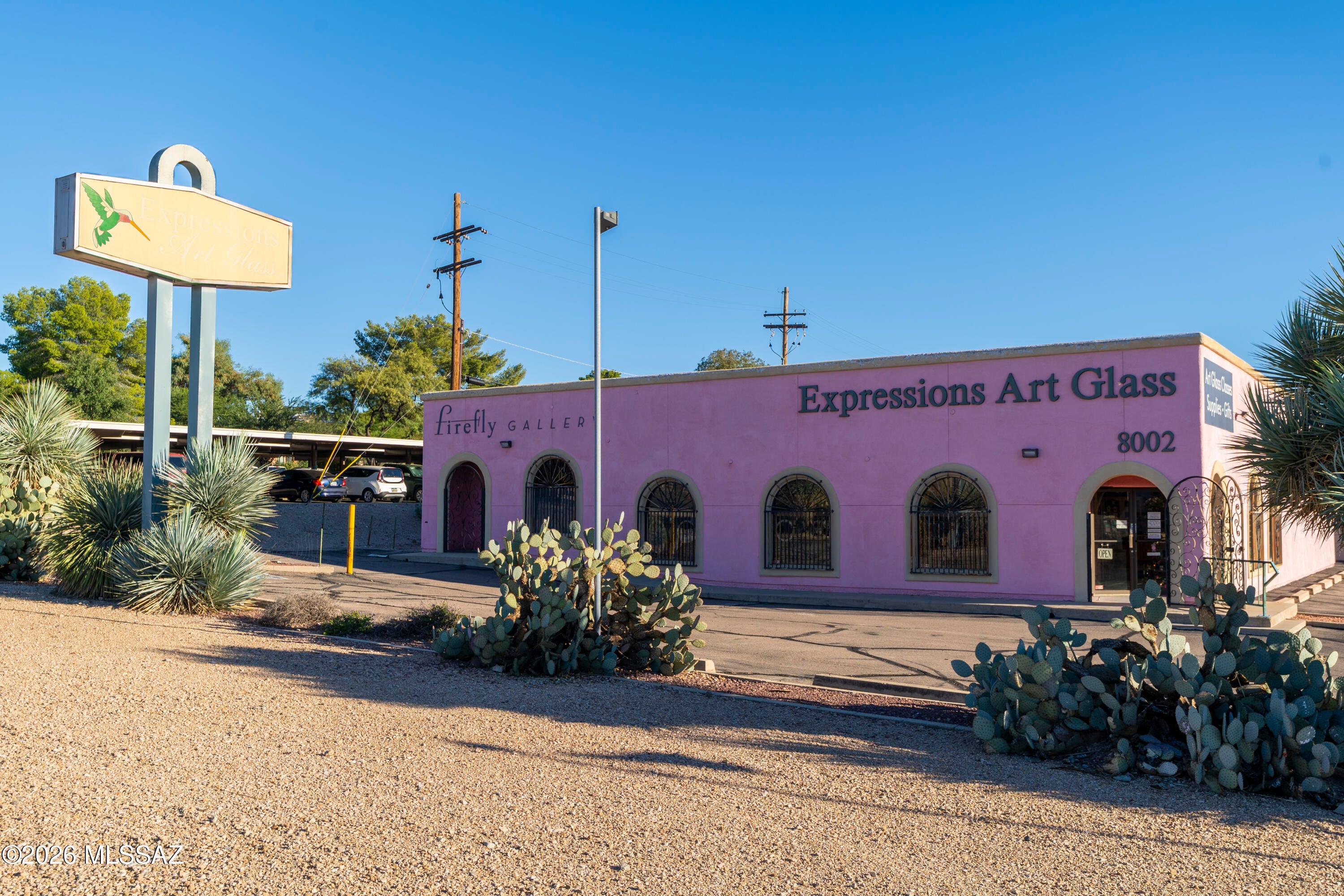 Broadway Boulevard visibility, standout monument signage and 28 parking spaces give your business a strong presence and a welcoming arrival. Excellent accessibility and approximately 130 feet of Broadway frontage create prominent exposure for your brand, while striking mountain views enhance the setting.

This well-maintained, C-1 zoned,  5,118 SF commercial building is currently divided into two suites that can be opened back up into one large, unified space. Retain the existing configuration for separate business functions or reconnect the interior around one operation. The larger west suite is reported as ADA compliant.

Open areas, offices, workshop space, storage and a kitchenette provide flexibility for a business seeking room to operate and grow. Existing grandfathered monument signage, offers a distinctive advantage for business identification, marketing and branding.

Sellers occupy both spaces and will be retiring. Business and trade fixtures also available on separate bill of sale.