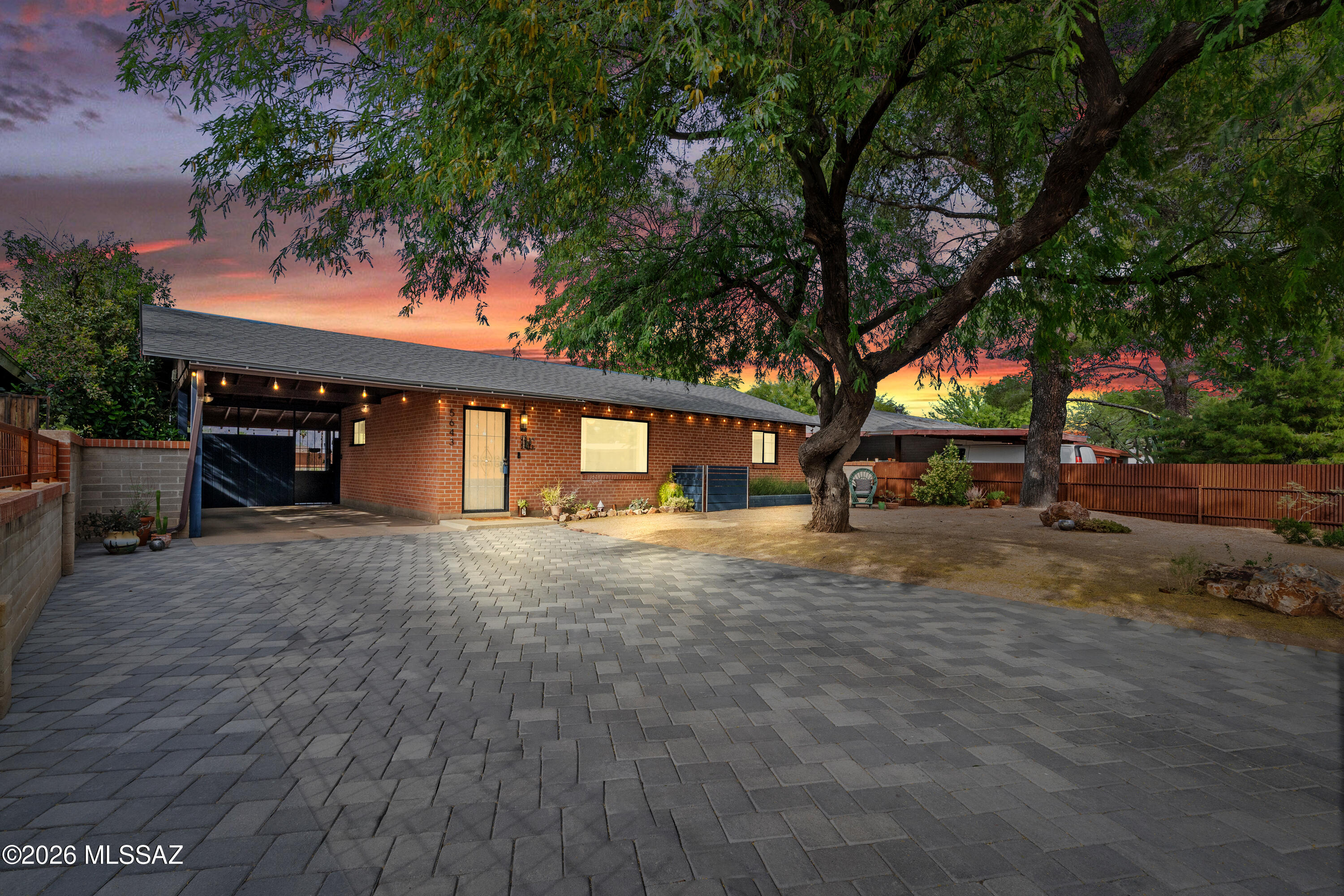 The one you've been waiting for.

Tucson living at its best in one of the city's most connected central neighborhoods. This thoughtfully updated 3-bedroom home delivers the kind of character and quality that's increasingly hard to find at this price point; a light-filled living room anchored by a massive picture window, colored concrete and wood floors throughout, and an updated kitchen featuring quartz counters, stainless appliances, subway tile backsplash, and under-cabinet lighting that makes the space feel both functional and refined.

The oversized owner's suite includes a beautifully updated bath with large walk-in shower, dual sinks, framed mirrors, and curated lighting. The details here were chosen with intention, not just for resale. Outside, the yard has been transformed; The tile paver driveway adds curb appeal from the moment you arrive. Custom iron fencing, low maintenance artificial turf in the rear, and a generous covered patio with mountain views create a private outdoor living space that Tucson's climate was made for. An Extra-tall Tuff Shed was installed in 2024, featuring an insulated door and dual-pane windows for efficient, high-quality storage. 

Major systems are handled; new roof 2022, and a whole house water filtration system. Newer stainless steel appliances round out a move-in ready package.

Situated along Tucson's planned Bicycle Boulevard corridor on the 3rd Street and University Boulevard section currently in progress; a city investment in the street and surrounding infrastructure that speaks to the long term trajectory of this neighborhood. Short distance to St. Joseph's Hospital, Tucson Medical Center, Park Place Mall, and the University corridor.

Central. Upgraded. Ready.