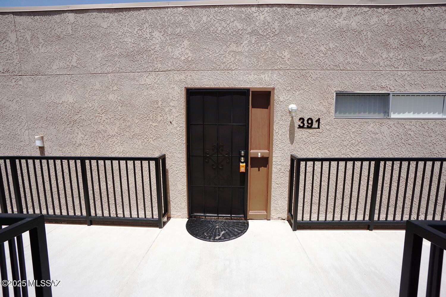 Discover this perfect desert retreat at La Vida Condominiums, this welcoming 1-bedroom, 2nd-floor condo offers the best of Tucson living near the scenic Starr Pass. Designed for both comfort and practicality, the interior features cool tile flooring throughout and a fully equipped kitchen complete with a refrigerator, stove, microwave, dishwasher, and a convenient stackable washer/dryer. Relax on your private covered balcony or enjoy the community's premium amenities, including a refreshing pool and clubhouse. This low-maintenance, pet-friendly home is perfect for those seeking modern convenience and a warm, inviting community atmosphere. Your desert oasis awaits!