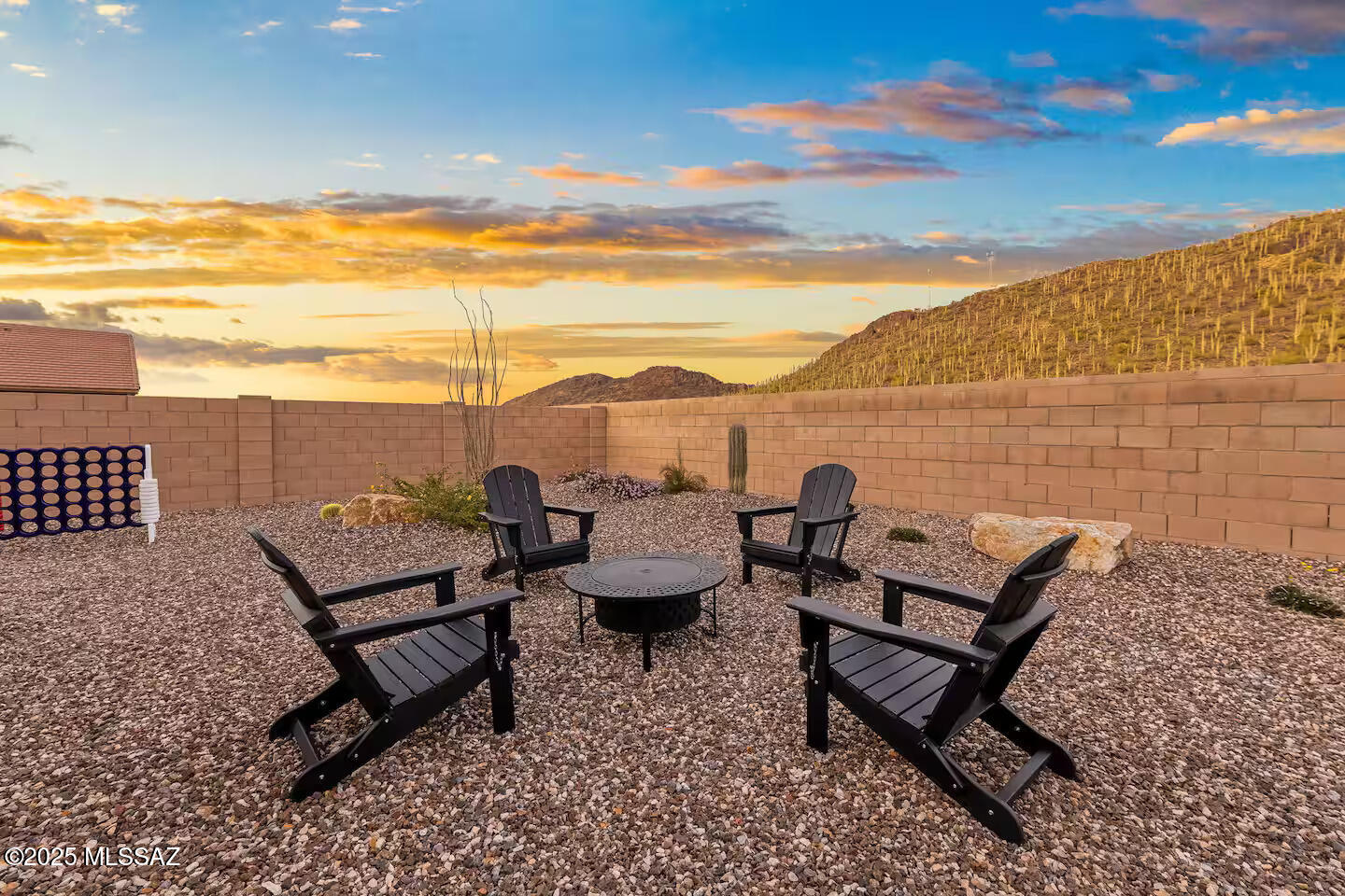 BEST DEAL IN SAGUARO BLOOM ON SUPER PREMIUM LOT!!! MOTIVATED SELLER! BRING ALL OFFERS! PRICED TO SELL THIS WEEK! UPGRADED, PROFESSIONALLY LANDSCAPED, ULTIMATE LOT, BETTER THAN NEW! UNDER MARKET PRICE!
 At the base of the iconic Twin Peaks Mountain, where the desert stretches wide and the sunsets melt into the horizon, a rare opportunity awaits. This brand-new, thoughtfully designed home is more than just a residence--it's a refined retreat nestled among majestic saguaro cacti offering a lifestyle defined by both comfort and tranquility!
From the moment you arrive, the natural beauty of the Sonoran Desert wraps around you. The peaceful neighborhood sets the tone for what feels like a permanent vacation with views that stretch endlessly and community amenities galore. Inside, the home opens up into bright, airy spaces that are both stylish and functional. The primary suite is an expansive,

private sanctuary featuring a spa-like ensuite bathroom and a walk-in closet.

It's the perfect setting for unwinding in complete privacy. Two additional guest bedrooms provide spacious accommodations for family or guests while a fourth bedroom offers versatility for a home office, studio, or additional guest space. The heart of the home is the fully equipped chef's kitchen, designed for entertaining and everyday living alike. With premium appliances and sleek finishes, it flows effortlessly into the open living and dining areas perfect for gathering with loved ones or enjoying quiet moments in front of the desert landscape. Step outside and you'll find a backyard unlike any other, framed by pristine saguaros and endless skies! Whether it's morning coffee with the soft light of dawn or a glass of wine at sunset, this is where the magic of the desert truly comes alive.
Beyond your doorstep, the community offers an incredible array of amenities: resort-style pools, a splash pad, tennis and pickleball courts, walking and nature trails, a state-of-the-art fitness center, and even a dog park for your four-legged family members. With nearby grocery stores and shops just minutes away, convenience is never compromised. This home isn't just a place to live it's a place to feel alive. A place where every day begins and ends with beauty, peace, and the sense that you've found something truly special.
Opportunities like this are rare, and this desert gem won't stay hidden for long. Schedule your private showing today and step into the lifestyle you've been dreaming of.