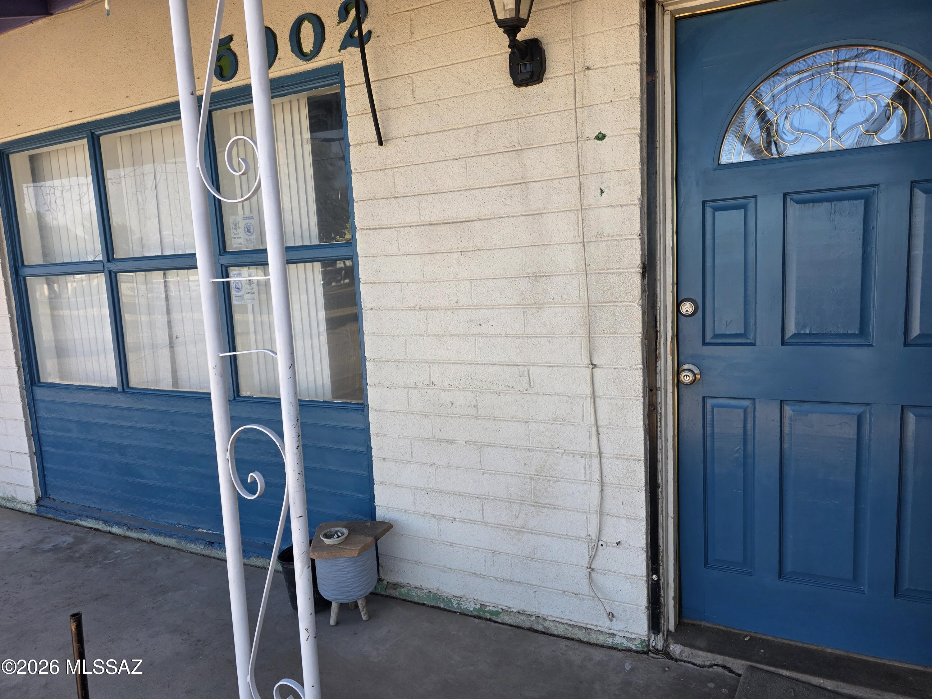 Great investment opportunity to own a triplex. Main house 2 bed/1 bath, east unit 1 bed/1 bath  and west unit 1 bed/1 bath studio. All leases month to month. Owner pays utilities. Shared meter. New single roof 2024.  Partially furnished. Covered porch with washer/dryer hook up.