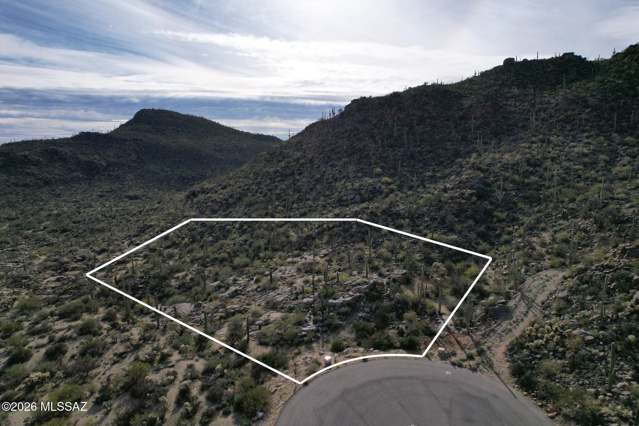 An excellent opportunity to build a custom home on this 1.07-acre homesite within Saguaro Ranch, a controlled acces community offering privacy and a relaxed desert lifestyle. Surrounded by natural Sonoran Desert landscape, this premium lot provides peaceful surroundings and attractive desert and mountain views. A great setting for designing a home that fits your vision while enjoying space, quiet, and a well-planned community. Site and development details available.