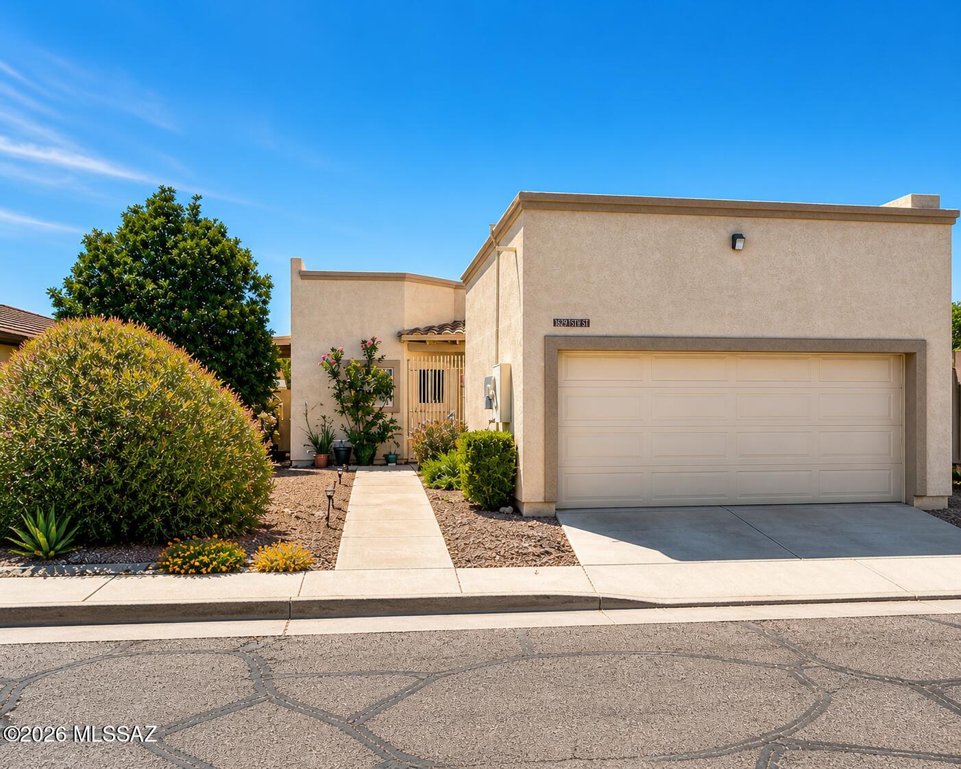 Quiet Community, Solar Panels Paid, and HVAC age around 5 years old. Great East Side location in a quiet, desirable neighborhood! This well-maintained 2-bedroom, 2-bath townhouse features a bright, open floor plan, a functional kitchen, and comfortable living spaces perfect for everyday living or entertaining. The spacious primary suite includes a private bath, and the home offers a 2-car garage for added convenience. Ideally situated near shopping, dining, and major roadways. Perfect for first-time buyers, downsizers, or investors, don't miss this opportunity!