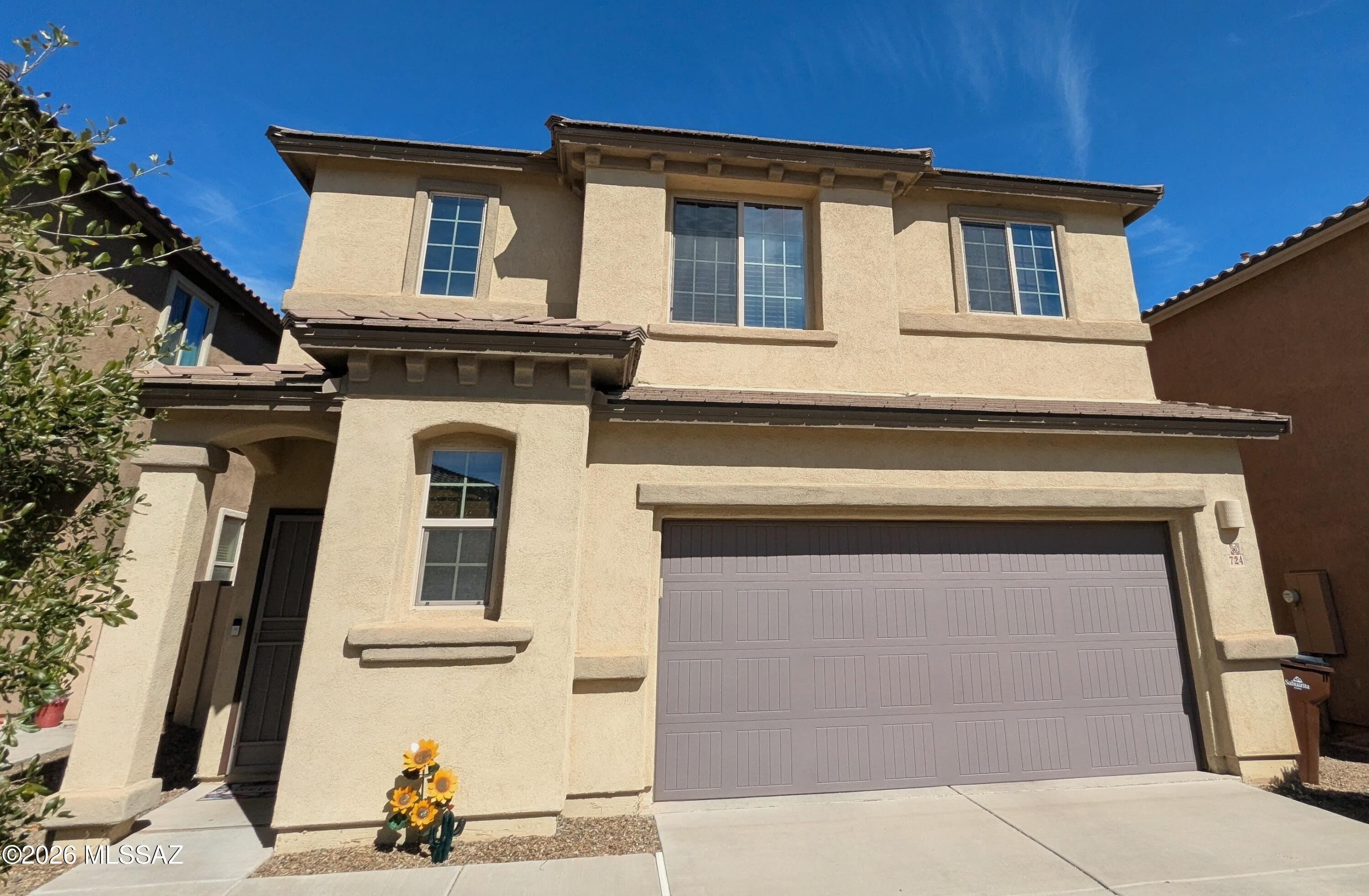 VA ASSUMABLE LOAN AT 2.625% 
PRICED BELOW COMPS!!!
This gorgeous 3 bed, 2.5 bath home, in the highly desirable Rancho Sahuarita, backs to a desert area, offering privacy w/ no neighbors behind, and stunning sunset and mountain views from the landscaped backyard.
Inside, enjoy a bright and open great room floor plan, perfect for everyday living and entertaining. The upgraded kitchen features dark stained cabinetry, granite countertops, tile backsplash, and new stainless steel appliances. The family room is equipped w/ surround sound prewiring and tile throughout the first floor, while a versatile loft awaits upstairs. A leased Tesla solar system is only $49 a month. Located close to the neighborhood park and pool, to take advantage of the amazing amenities throughout the community.