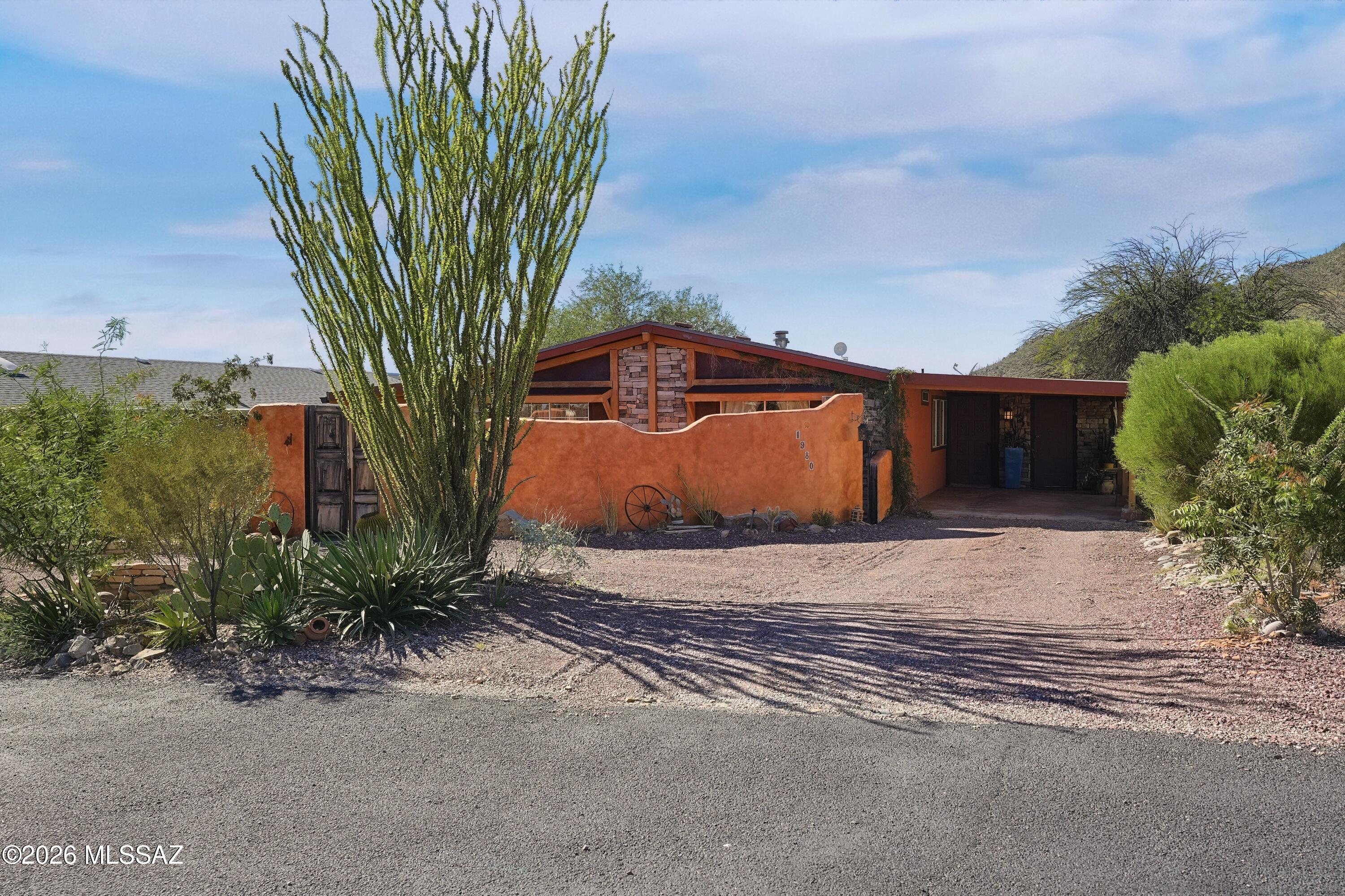 Welcome to Tucson Estates, a sought-after 55+ community! This well-maintained 3-bedroom, 2-bath home offers 1,568 sq. ft. of comfortable living with vaulted ceilings, an open floor plan, and abundant natural light. The spacious kitchen features stainless steel appliances, a center island, pantry, breakfast nook, and breakfast bar. The primary suite includes a walk-in closet and private bath. Relax on the screened patio, front porch, deck or courtyard while taking in Arizona's beautiful mountain views and sunsets. Community amenities include a pool, pickleball, tennis courts, and more, all conveniently located near shopping, dining, golf, and outdoor recreation.