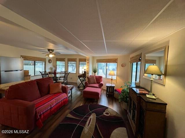 Welcome to Western Way RV Resort, a vibrant 55+ active adult community nestled in scenic Tucson! This charming, fully furnished 1-bedroom, 1-bath manufactured home offers 550 sq ft of comfortable living with stunning mountain and sunset views. Enjoy modern touches like laminate flooring, stainless steel appliances, a full dining area and a cozy breakfast bar. Relax on the covered deck or patio surrounded by low-care landscaping and a tall fence for privacy.  There is also generous covered parking & a storage shed.  Community amenities include pickleball, pool, spa, recreation room, exercise facilities, laundry facilities, water, sewer, garbage and much much more.
