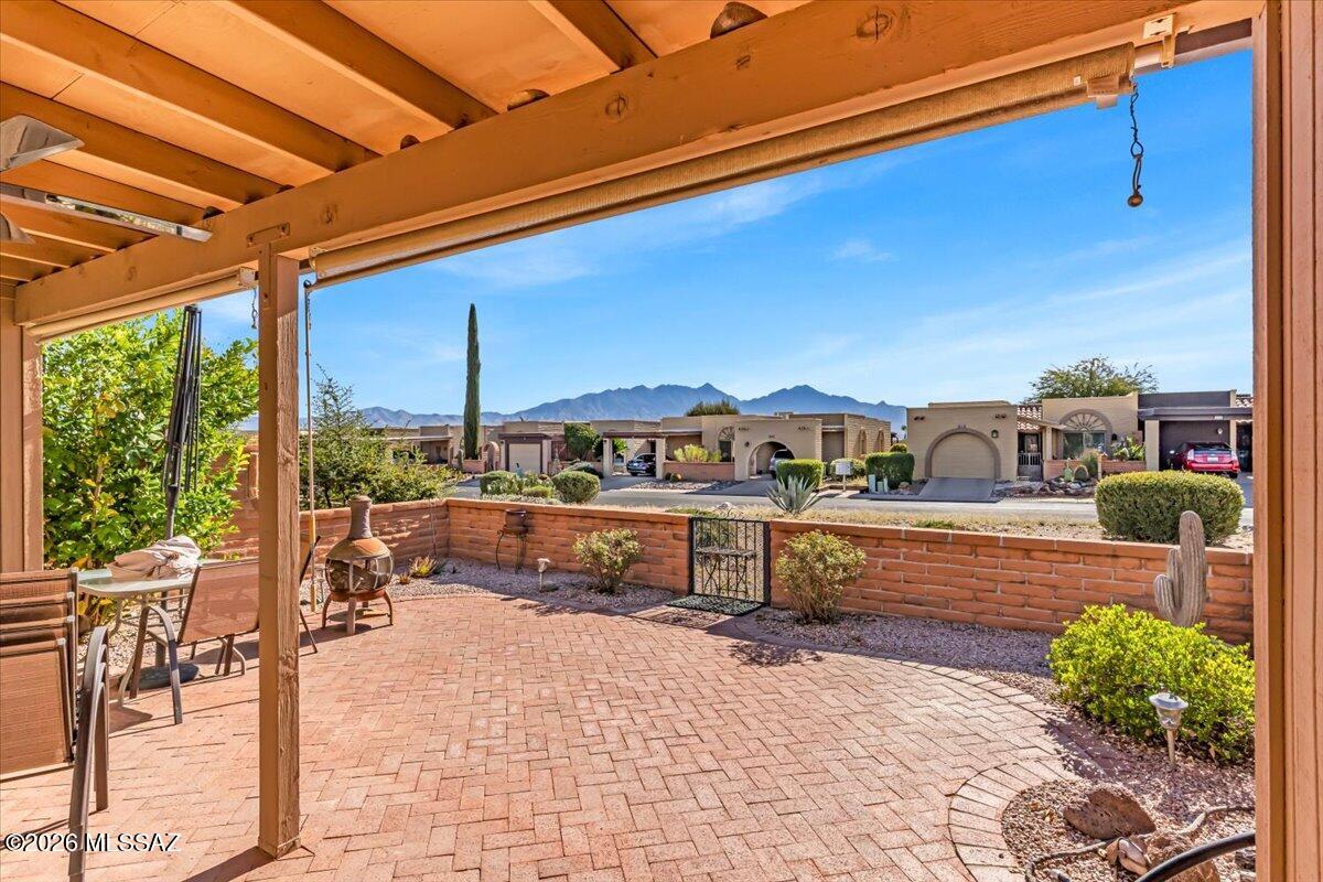 Enjoy stunning MOUNTAIN VIEWS from the inviting back patio, an ideal space for relaxing mornings or entertaining guests. Inside, this well-maintained home features thoughtful updates that enhance both style and functionality.

The kitchen is equipped with newer slate appliances, expanded cabinetry for added storage, and tiled countertops. Tile flooring flows seamlessly through the main living areas, creating a clean and cohesive feel.

Both bathrooms have been tastefully updated with newer countertops and refreshed shower surrounds, offering a modern touch throughout.

Additional value comes with a  RE-COATED ROOD (2026),  which includes a 2-year warranty.

Bonus: Termite Warranty + a 1-year home warranty is included.
