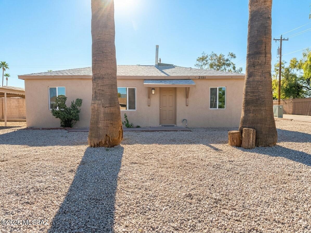 Complete Remodle! New everything! AC, kitchen, baths, paint in/out, stucco, flooring, dual pane windows, appliances, WH, fresh landscape. Large lot, backyard completely fenced. Covered carport. Corner lot! Ready for new family! Owner/agent.