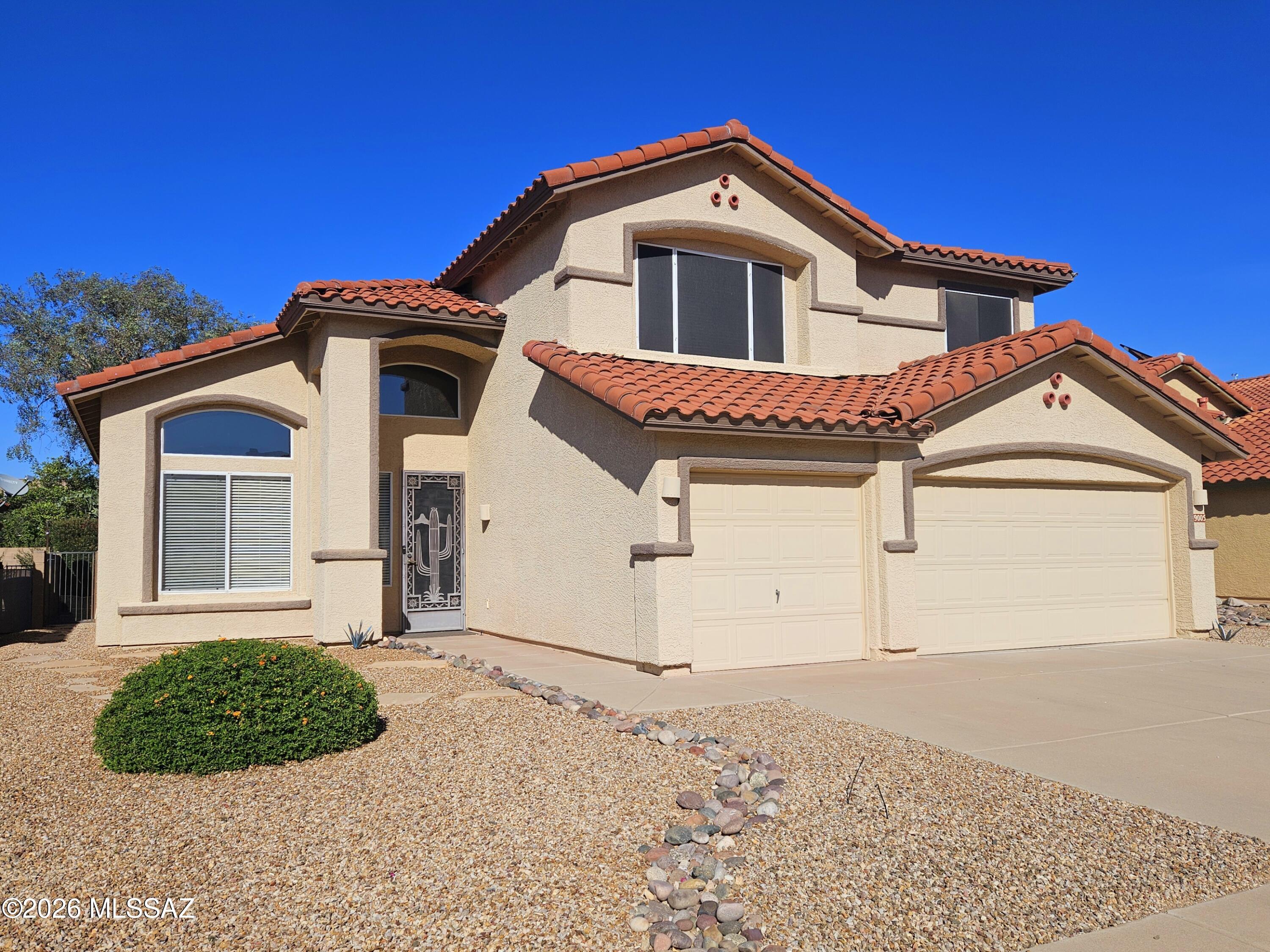 Super sharp, exceedingly clean, naturally bright and updated home in Rita Ranch!  Newer roofing, newer dual cooling with newer Lennox multi-speed ACs/heating (both), newer water heater, carpeting, toilets, full plumbing re-pipe in 2022.  Wonderful kitchen with granite counters and island, newer appliances. Great primary suite, bath with granite counters, separate tub and shower, walk-in closet, own balcony with views. Flexible loft area and bedrooms to spare. Awesome private backyard, 3-car garage. Move right in, don't let this one get away!