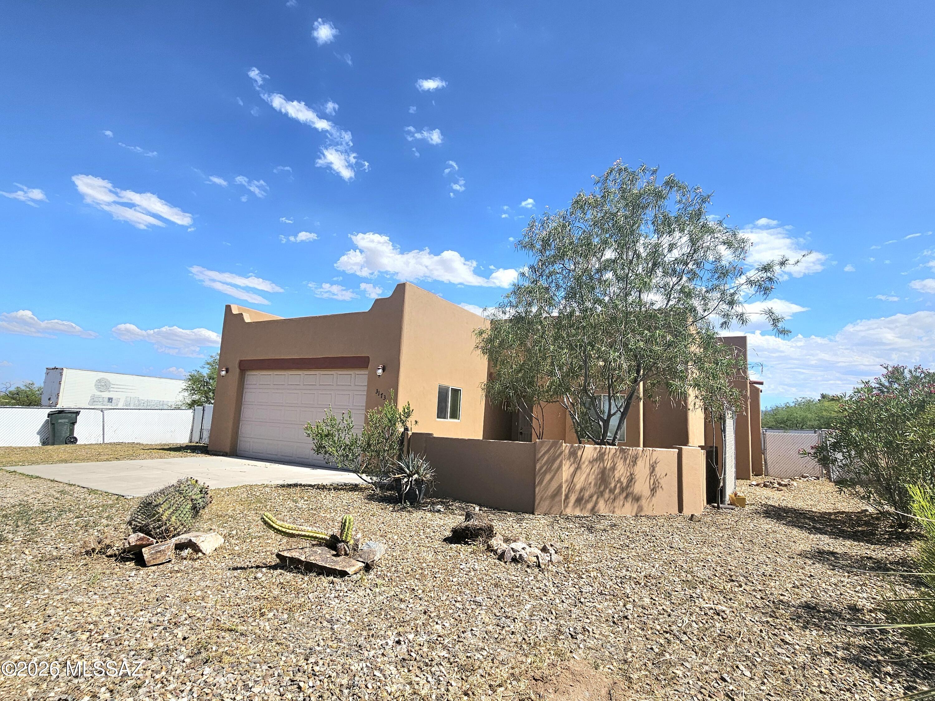 Move-in ready and turn-key! This site-built home in Mescal Lakes has been freshly painted. New water heater, dishwasher, kitchen faucet and new toilets just installed. Enclosed Arizona Room with an attached Bonus room/workshop. Bonus room/workshop has 220 electric and workbench great for hobbies/crafts, projects or art studio, or could easily be turned into a 3rd bedroom/guest quarters. Sale includes adjacent lot APN #124-15-720 for a total of 0.38 acres. Taxes reflect both lots. Priced below market. This one won't last long!