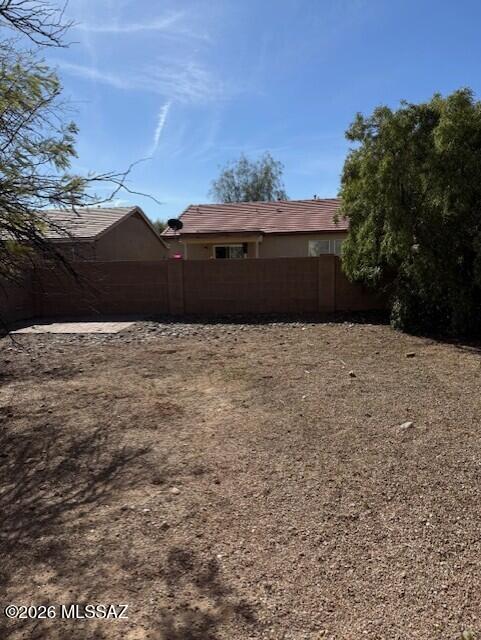 Home is a 3 bedroom, 2 bath, 2 story with a 1 car garage.  Home has the family room off the kitchen and access to the rear yard of the dining area.  Home has all applianes and is ready to move into with a little TLC.  Yard is low care with a drip system.  Home is in a good central location, convenient to Schools, U of A, shopping and the Loop.  The north south orientation, makes the backyard useable all year.  Due to condition, the property may have health/safety risk(s). Prior to entry / access, all parties must sign a Hold Harmless Agreement and the property may only  be shown by appointment.