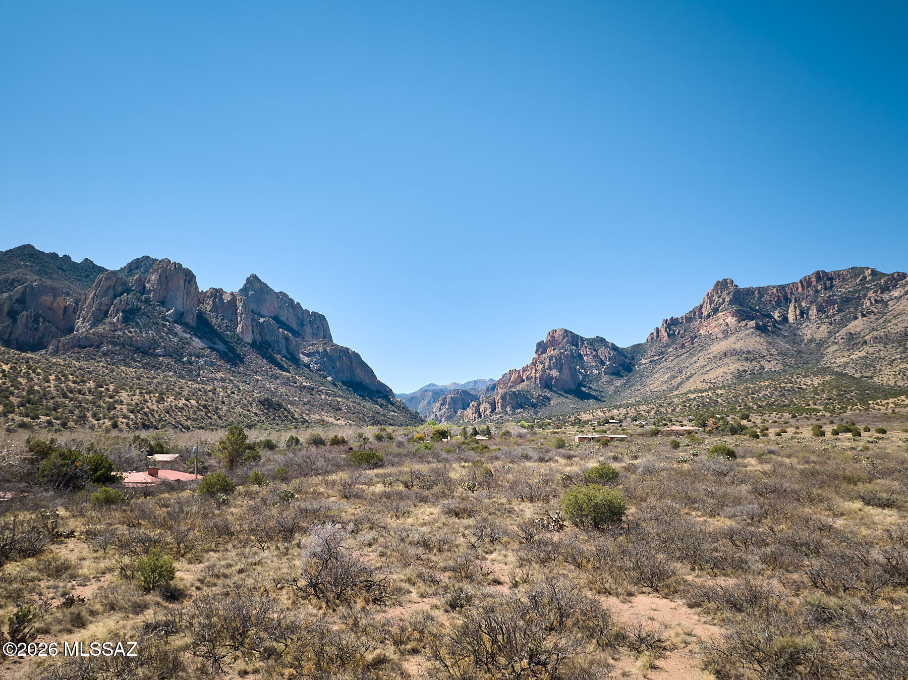 Discover nearly 7.5 acres of prime, flat land in the heart of Portal, Arizona, one of the Southwest's most breathtaking and unspoiled mountain communities. Nestled at the edge of the Chiricahua Mountains, this exceptional parcel offers jaw-dropping, panoramic views in every direction-towering rock formations, wide-open skies, and dramatic desert sunsets that never get old. The lot is level and fully usable, making it ideal for building your dream home, a retreat, or a quiet getaway surrounded by nature. A power box is already on the property, adding real value and making future development easier and more cost-effective. Portal is known for its dark night skies, peaceful atmosphere, and incredible wildlife, attracting birders, hikers, artists, and anyone craving space and serenity.