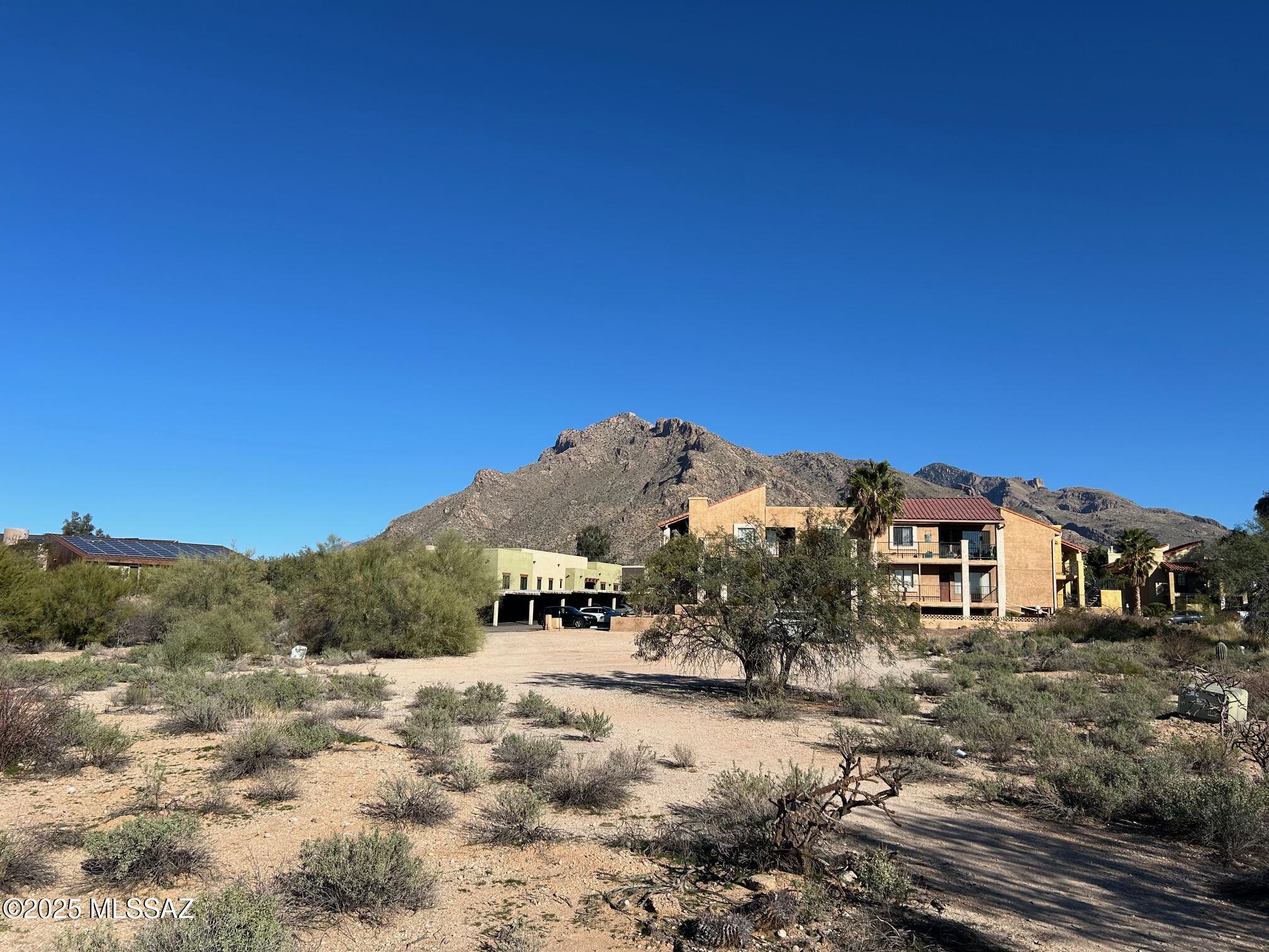 UNIQUE ORO VALLEY INFILL OPPORTUNITY! Fabulous location just north of Oracle/Magee intersection with Oracle Rd access. Development or Investment potential. Oro Valley R-S zoning for up to 31 units with a minimum lot size of 5400 sq. ft. Excellent, established multi-family area. With Town of OV approval, build multi/single family residences, business or professional offices, elder care, etc. Some wet and dry utilities installed on or by site. Aggressively priced at $990,000. Very limited land supply in high traffic OV locations.