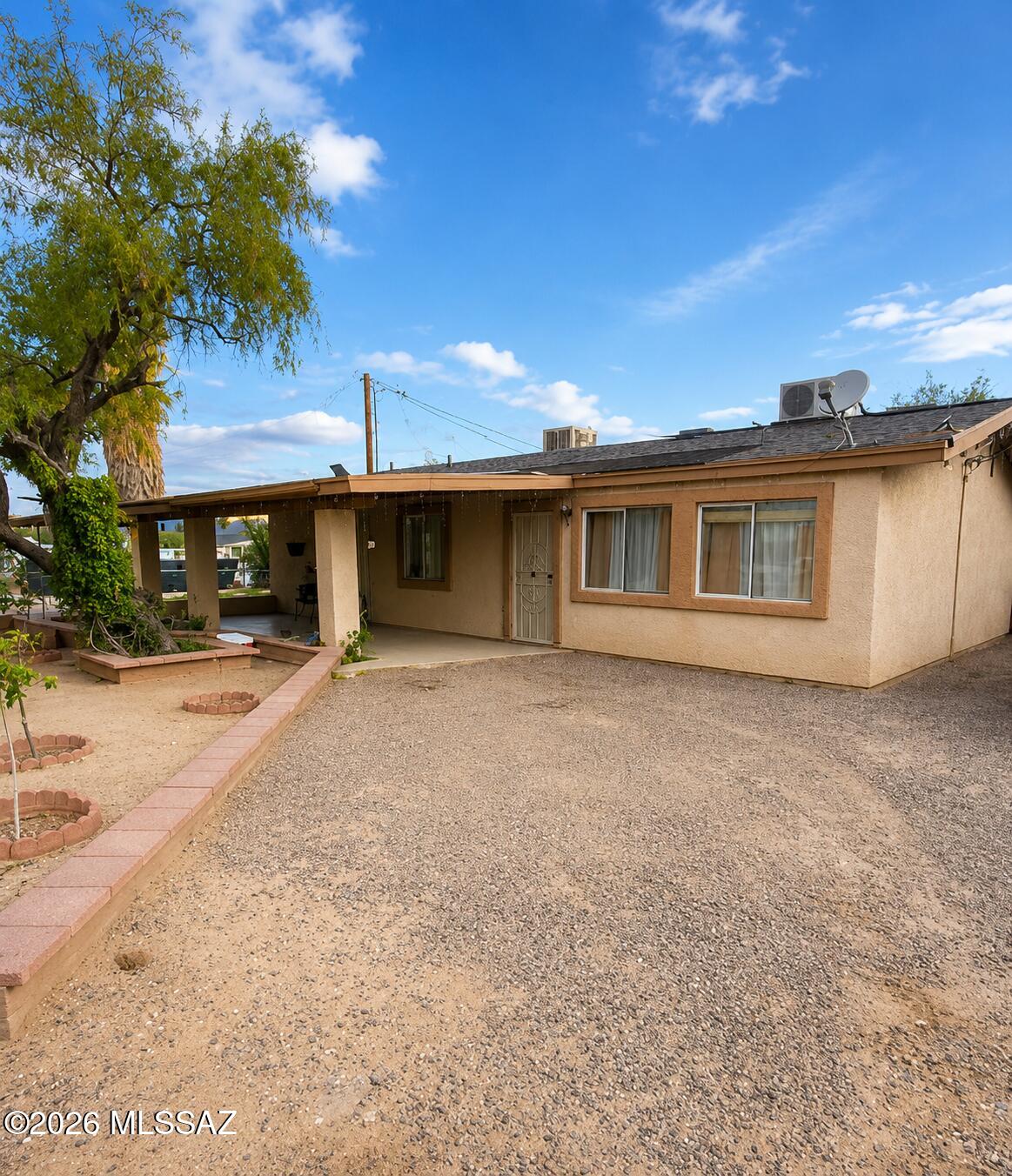 Excellent investment opportunity! This unique owner-built home, completed in 2002, offers endless potential for renovation. Featuring vaulted ceilings, custom tile flooring throughout, and distinctive architectural details, the property is full of character and ready for a new vision. Situated on a desirable corner lot. The home requires a new roof and is being sold as-is, making it an ideal project for investors, flippers, or buyers looking to add value.