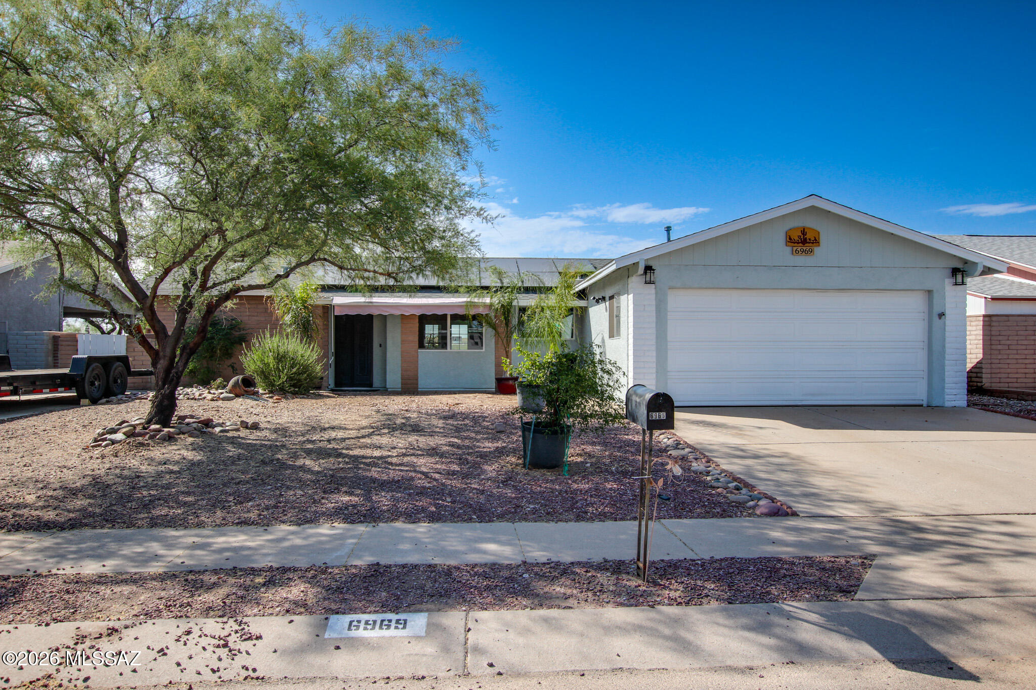 Excited to share a new listing in the desirable Horizon Hills neighborhood. This beautifully updated home features a two-car garage, no HOA, and no rear neighbors, offering both privacy and convenience near shopping, dining, the I-10, and The Loop bike path.

Key updates and features include:

  - Recent Improvements: New LVP flooring throughout (no carpet), new interior and exterior paint, and newly painted cabinets with updated hardware (all 2026).
  - Major Systems: A new roof installed in 2025, new energy-efficient windows (2026), and solar panels for significant utility savings.
  - Spacious Layout: A large primary suite with ample closet space and an attached den that can easily be converted back into a third bedroom.
  - Outdoor Living: A tranquil backyard featuring a large covered patio, flagstone detailing, and a storage shed. The property opens directly to the natural desert and The Loop bike path.

This exceptional property is a Must See, Schedule your showing today!