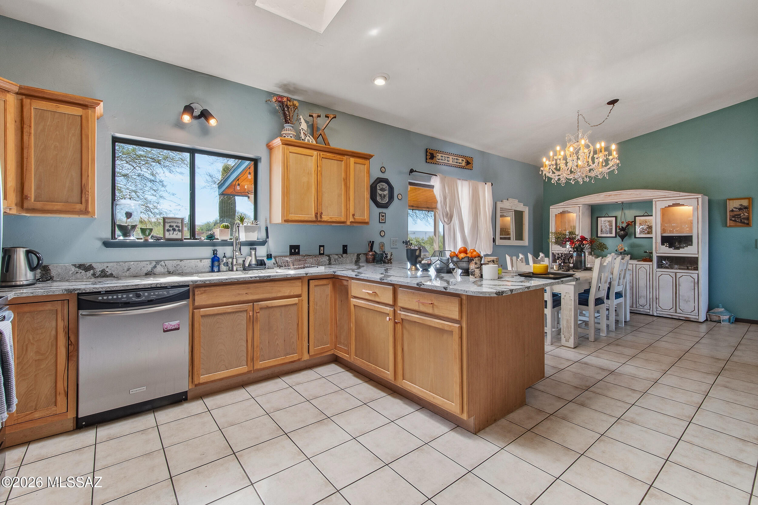 Welcome to a 3 bed, 2 bath home situated on a full acre with beautiful mountain views! The remodeled kitchen opens to a cozy living area with a wood-burning fireplace. The 2-car garage includes built-in cabinets and its own mini split, perfect for a workshop or gym. Enjoy RV parking, a water filtration system, and a septic system that recently passed inspection. The backyard includes a designated horse area, offering flexibility for animals or outdoor use. Space, views, and versatility all in one!