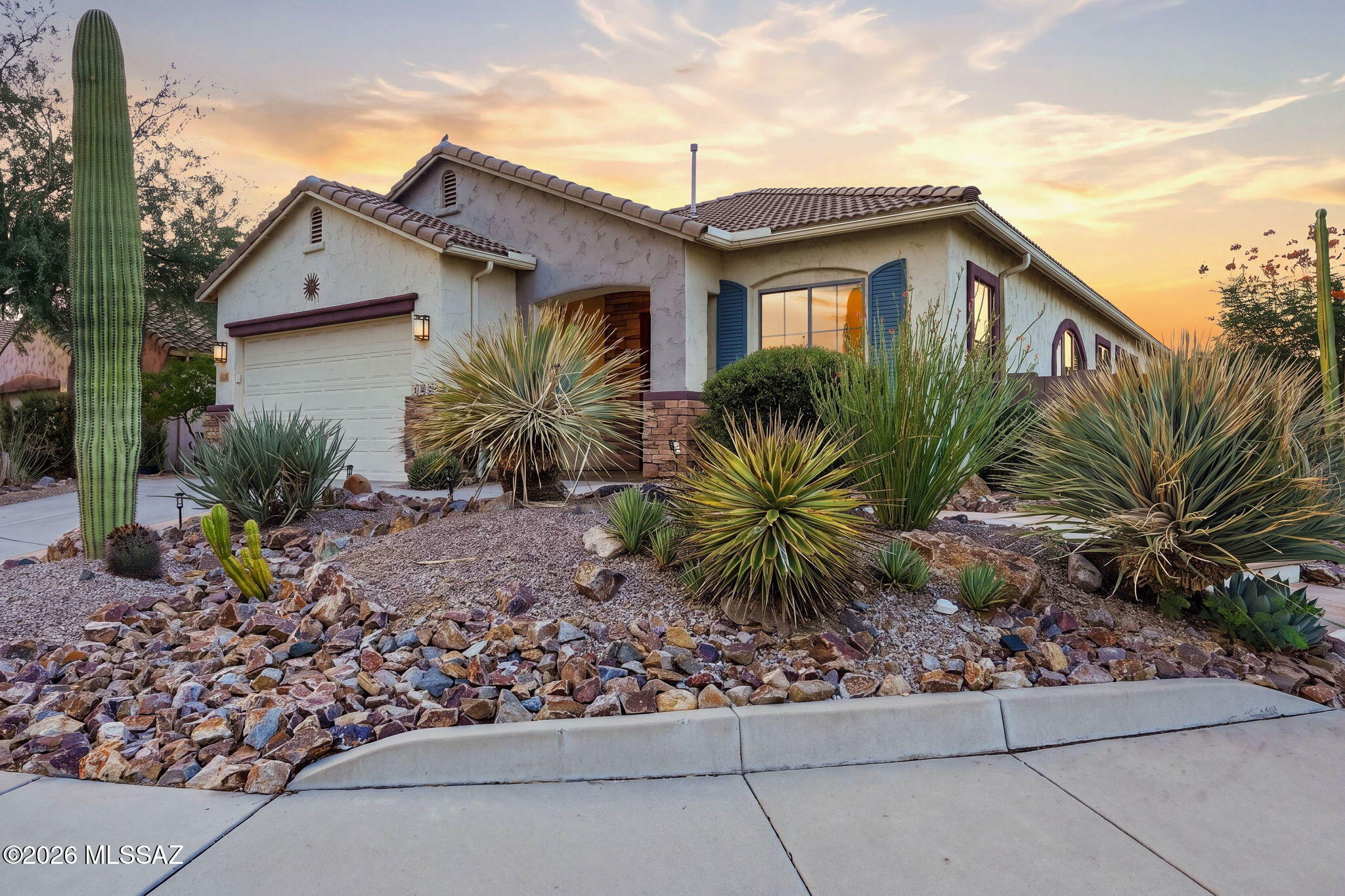 Located on a corner lot in the Somerset Canyon neighborhood of Rancho Vistoso, this beautifully and impeccably cared-for home offers a wonderful combination of space, flexibility, storage and inviting indoor-outdoor living. The thoughtfully designed floor plan features a versatile den, along with formal living and dining areas and a separate family room, providing plenty of room to gather, entertain, work or simply settle in. At the heart of the home, the spacious kitchen offers generous cabinetry and counter space, an extended granite island, stainless steel appliances, roll-out cabinet shelving and a large walk-in pantry. The primary suite continues the theme of space and functionality with two custom walk-in closets featuring extensive built-in shelving and drawers, along with a generous bath with dual vanities, soaking tub and separate shower. Throughout the home, 18x18 ceramic tile, shutters, Hunter Douglas blinds, distinctive stained-glass accents and light fixtures add character, while a laundry room with built-in cabinetry and utility sink provides even more everyday convenience. A Lennox heating and cooling system replaced in 2022 and other thoughtful improvements add to the home's appeal. Then step outside, where this home truly shines. Surrounded by mature desert landscaping, the backyard offers a relaxing and inviting setting with a covered patio, built-in BBQ, gazebo, gas fire pit, water feature and warm landscape lighting, creating the perfect atmosphere for morning coffee, Arizona sunsets and evenings under the stars. All of this is set within Rancho Vistoso, known for its parks, trails and beautiful Sonoran Desert surroundings. With generous living spaces, exceptional storage, a flexible floor plan and an outdoor setting you'll want to enjoy year-round. Schedule your tour today! 



--