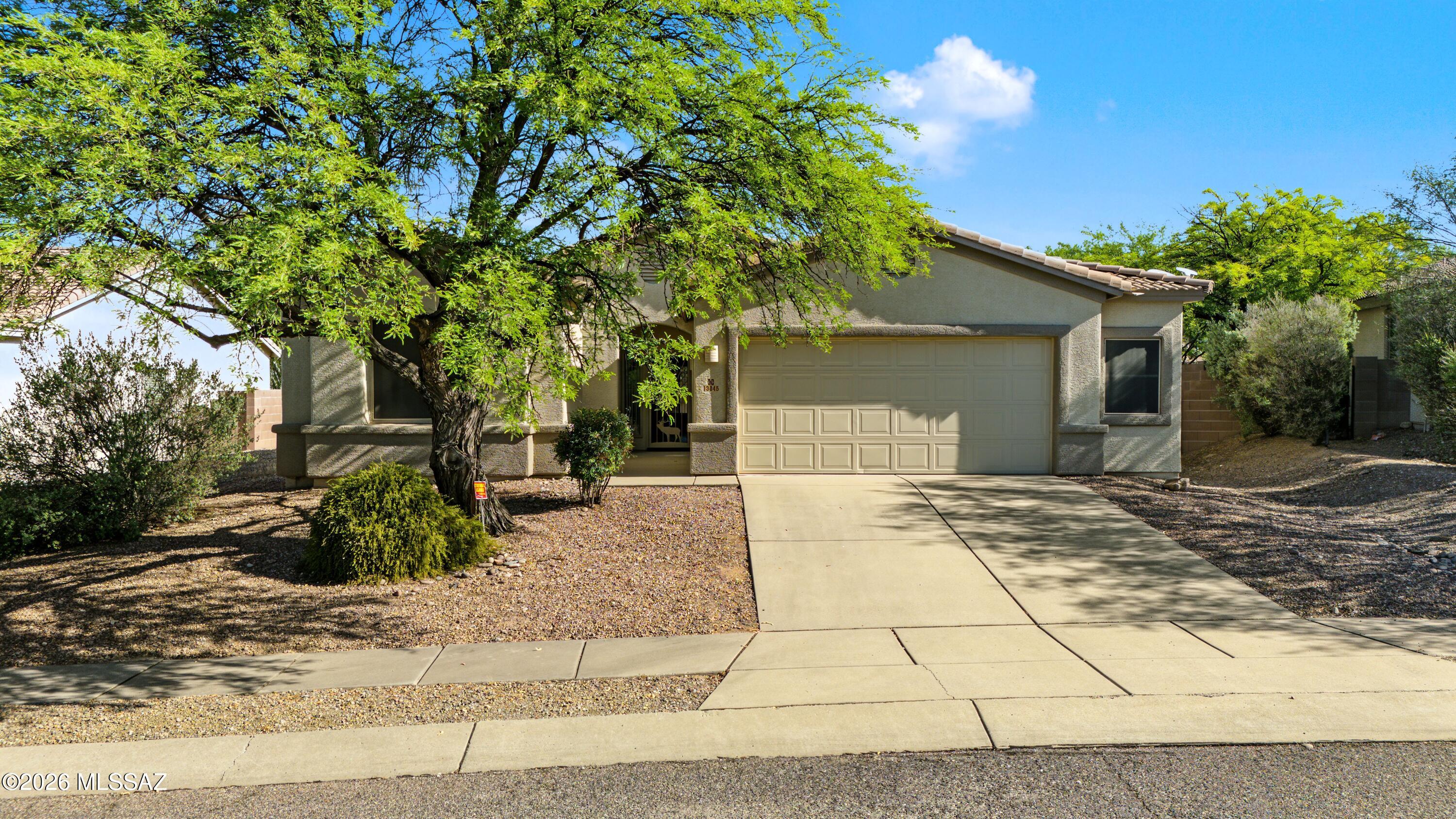 Welcome to this well-maintained 3-bedroom, 2-bath home in desirable Rancho Del Lago! Offering 1,667 sq. ft. of comfortable living space, this 2002-built home features a spacious kitchen with abundant cabinetry, center island, and plenty of room for meal prep and entertaining. Tile and carpet flooring throughout, plus a convenient bonus desk/workspace in the hallway. The low-care backyard is designed for easy living and features a large patio space - perfect for outdoor dining, relaxing, or entertaining. Enjoy the community's walking trails and convenient access to the highly regarded Vail School District. Previously used as a rental income property, this home offers an excellent opportunity for a homeowner or investor.