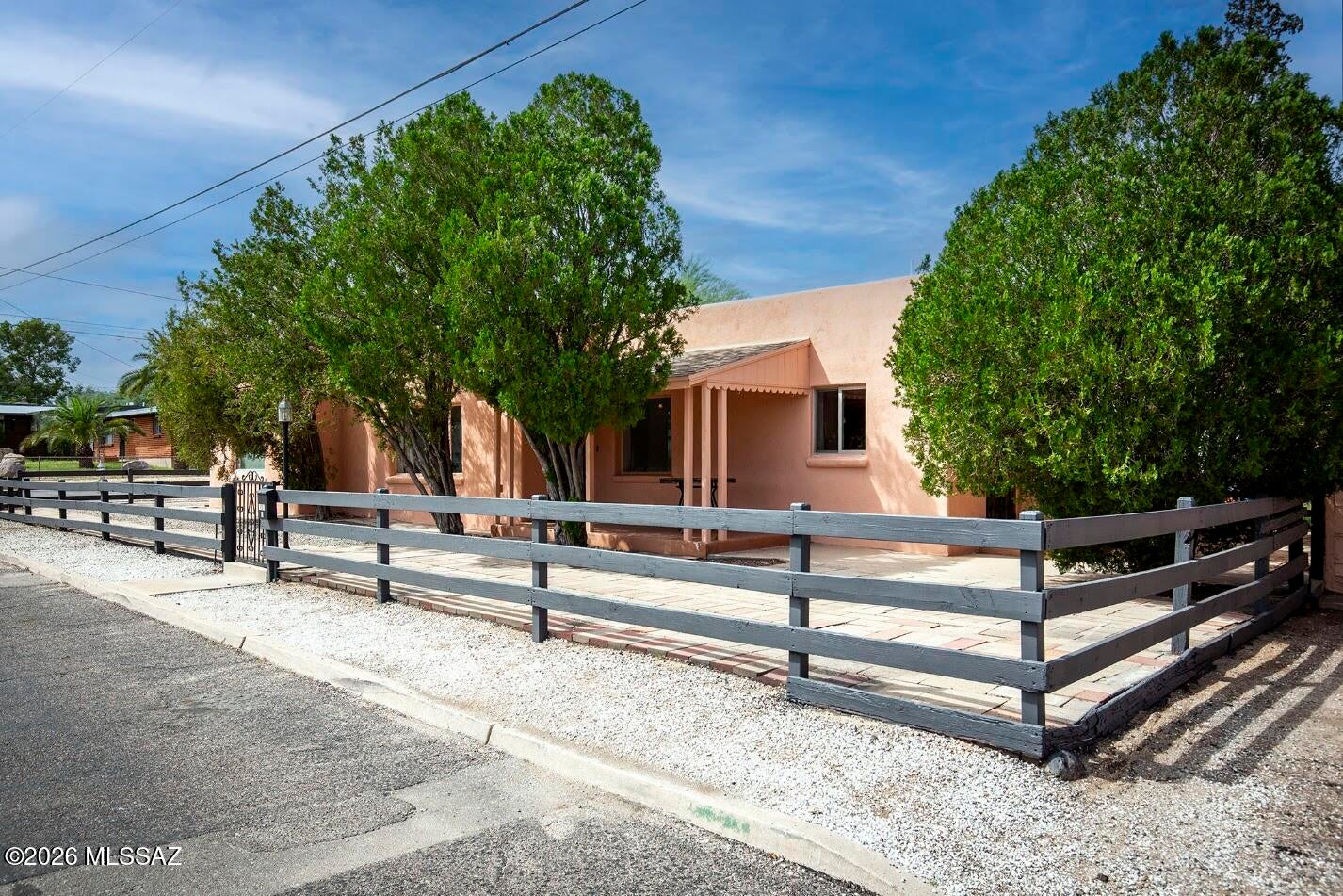Two homes, one exceptional central Tucson opportunity! This charming 1940s adobe bungalow pairs authentic character with flexible living and income potential. The main residence offers 2 bedrooms and 1.5 baths, featuring original built-ins, warm midcentury woodwork and the timeless texture of lath-and-plaster interiors. A separate 1-bedroom, 1-bath guest house has its own private entrance--ideal for rental income, extended family, guests or a private workspace. The residences share a laundry area and two-car garage. Improvements made over time include updated gas lines, HVAC, water heater and many dual-pane windows. Located along a bike route with convenient access to the University of Arizona, downtown, shopping, dining and Tucson's popular central neighborhoods. A distinctive multi-home The residences share a laundry area and two-car garage. Improvements made over time include updated gas lines, HVAC, water heater and many dual-pane windows. Located along a bike route with convenient access to the University of Arizona, downtown, shopping, dining and Tucson's popular central neighborhoods. A distinctive multi-home property with vintage charm, practical updates and multiple possibilities!