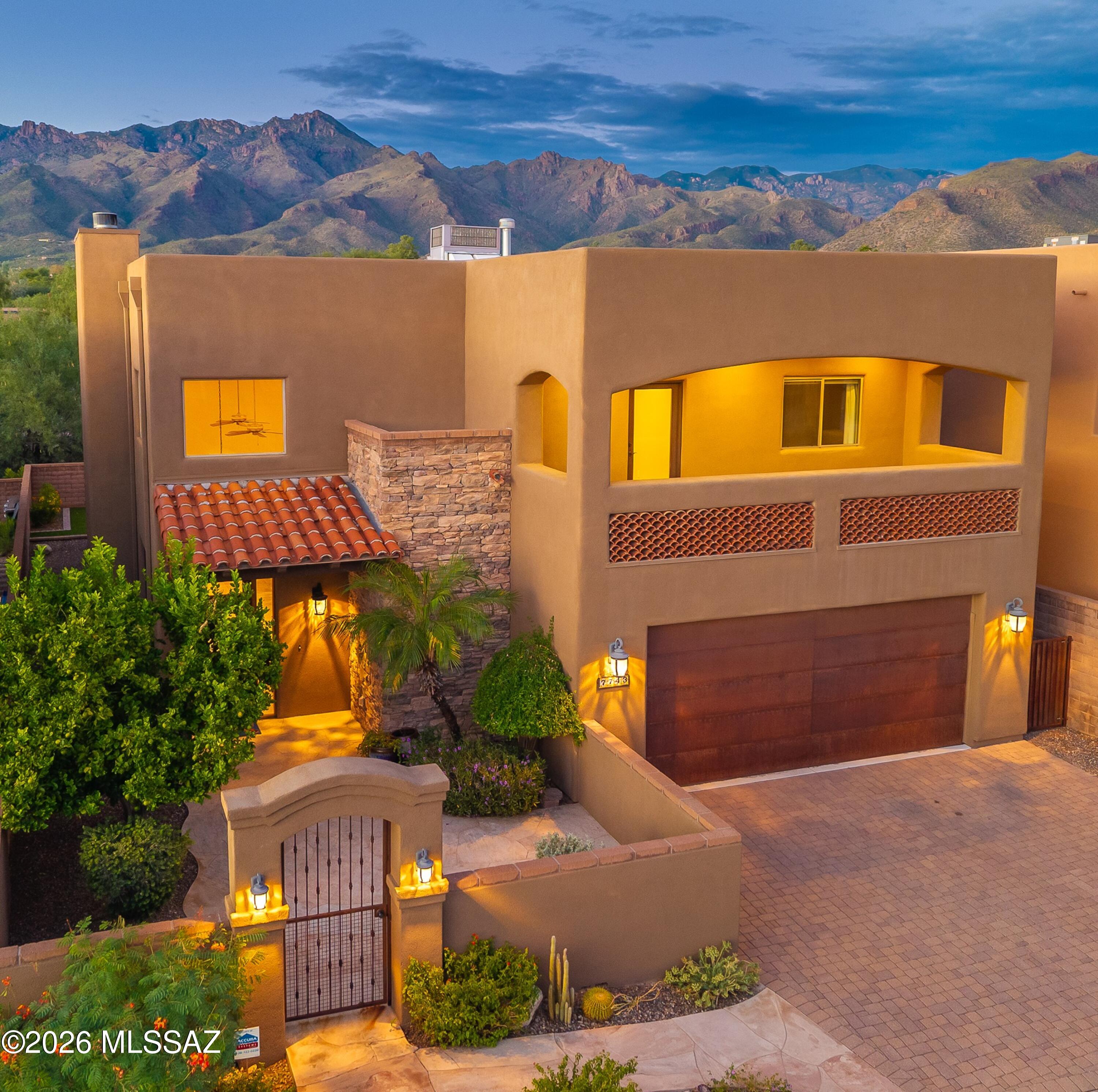 Quality Foothills Living in Sabino Enclave! Exceptional quality & craftsmanship define this 3,510 sq ft turn-key residence w/ rich Knotty Alder cabinetry, Granite countertops, Travertine & Wood floors, Slate accents, solid Wood Doors & brand-new high-grade carpet. Exceptional Great Room design concept w/ dramatic 22' Stone Fireplace, exquisite wrought-iron detail & Sonos/Surround Sound Audio Systems. Versatile floorplan w/ 5 bedrooms, 3.5 baths, expansive Loft + Office/Game Room. Spacious downstairs Primary Suite w/ Stone Fireplace, elegant Renovated Bathroom + dual Walk-In Closets. Upper level View Decks offer captivating Mountain Views. Inviting Private Backyard designed for entertaining w/ built-in BBQ, Gas Firepit, Paver Patios, turf area & uniquely cool Dog-Run. District 16 Schools.