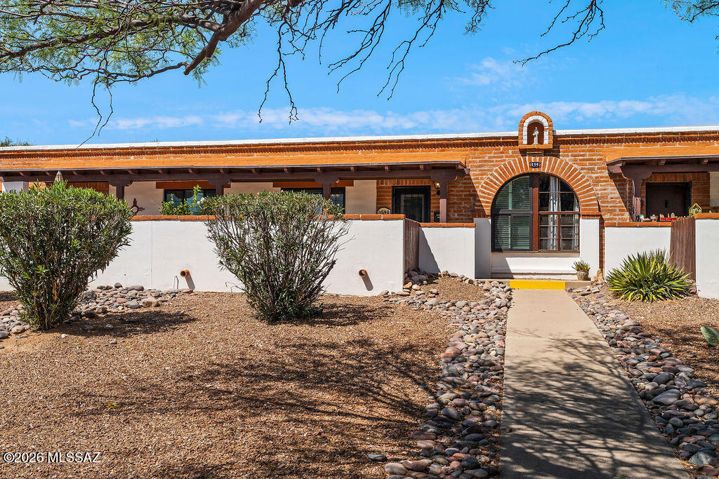 Welcome to this beautifully updated, partially furnished lock-and-leave townhome in Green Valley, located in the desirable Villas West community. Enjoy an east-facing covered travertine tiled patio with mountain views--perfect for relaxing mornings. Inside, this move-in ready home features modern finishes throughout. The kitchen offers quartz countertops, a gas range, large stainless-steel sink, newer dishwasher, under-cabinet lighting all opening to a bright and functional living area. Updated windows help reduce outside noise for added comfort. The spacious bedroom suite includes an updated vanity, granite countertops, and a walk-in shower. A private rear storage room with washer and dryer provides convenient in-home laundry. The HOA covers air conditioning and heating, exterior maintenance, roof repair and replacement, water, sewer, trash, pest control, and more--ensuring easy, low-maintenance living. Ideal as a full-time residence, winter retreat, or investment opportunity.