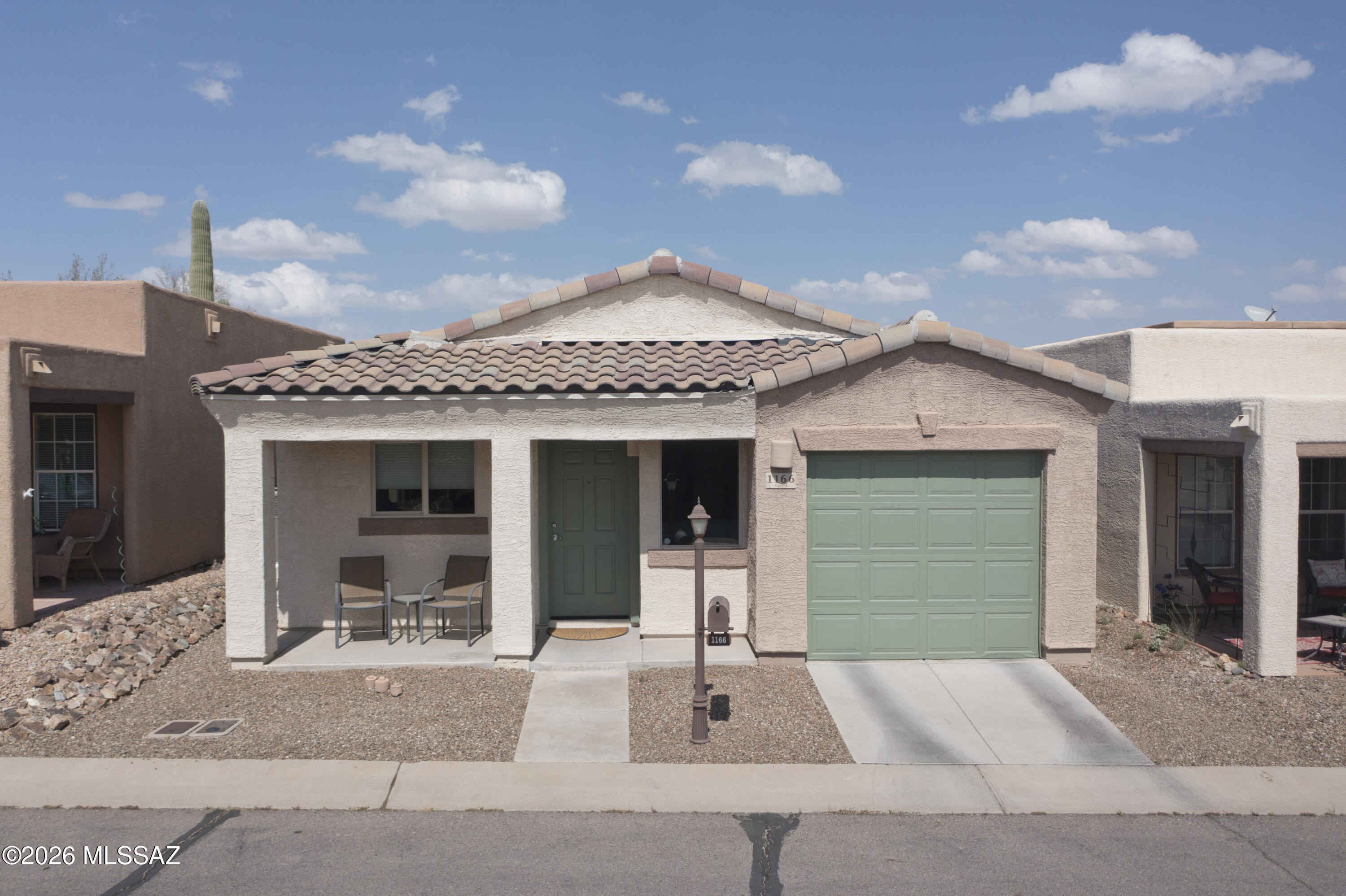 VA assumable loan at 2.75%. WOW, fully furnished & move in ready shows like a new model home. You must checkout this home. The washer hasn't been used, nor the stove! It's close to a beautiful park, recreation center, and ball courts. The park features a pool with little cabanas to relax in. It's like a destination resort! You're sure to enjoy this little bungalow, it's so quaint and easy to care for. Right down the street is a shopping center with fine dining, banking and everything you need. The area is nestled in the shadow of 9,000ft Mount Wrightson. John Wayne made a bunch of westerns in this area years ago. People travel the world, just to come here and bird, it's absolutely beautiful. Home is furnished and move in ready! I want to show to you, so make sure to give me a call.