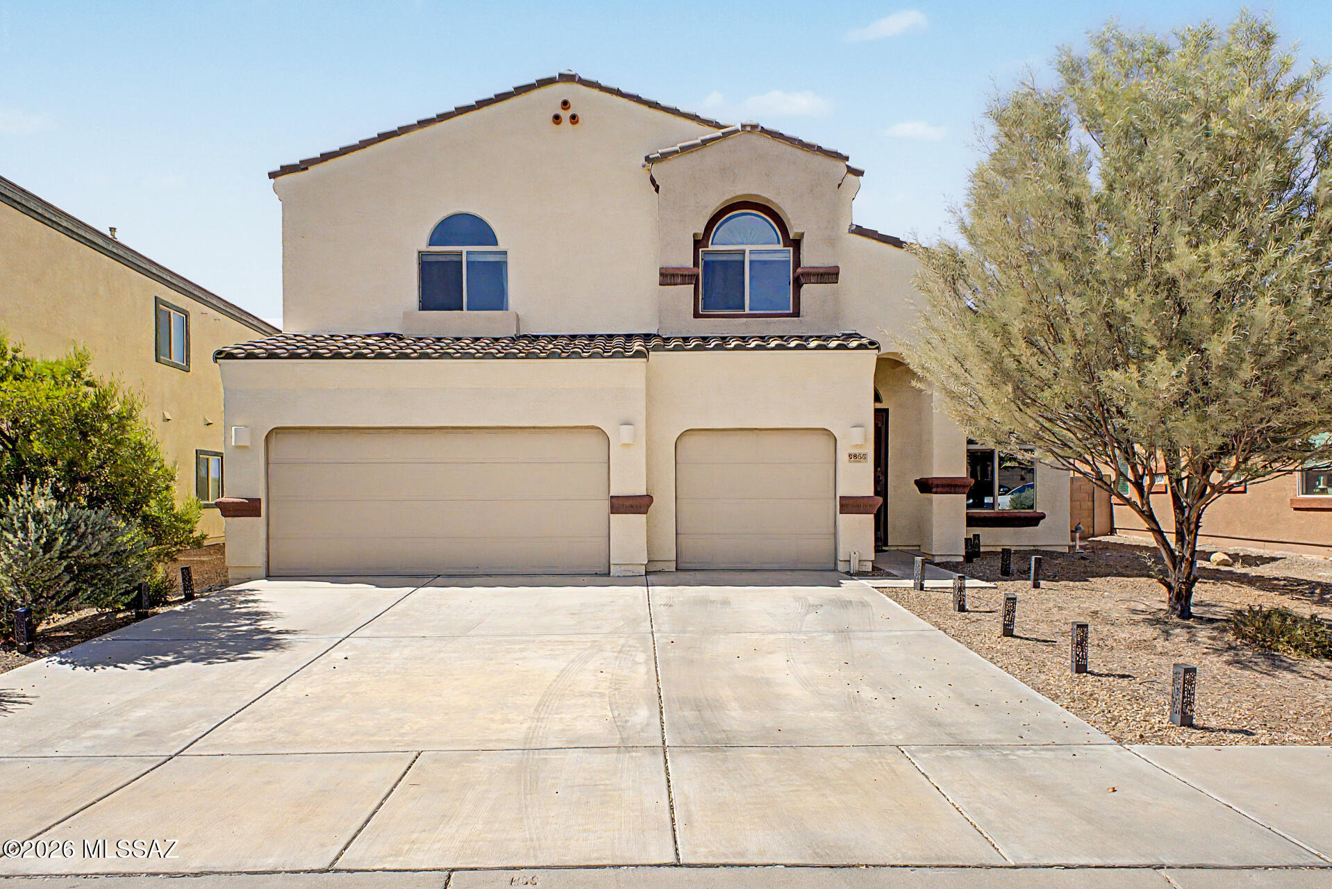 Beautifully maintained and exceptionally spacious, this impressive home in the coveted Oasis Hills neighborhood backs to natural open space and showcases Tortolita Mountain views. Offering 3,185 sq. ft., 4 bedrooms plus an expansive upstairs loft, 3 full bathrooms and a 3-car garage, this residence is designed to exceed expectations. You are welcomed by a formal living and dining room with soaring vaulted ceilings that lead into a warm and inviting family room and open-concept kitchen. The kitchen is well-appointed with granite countertops, a custom tile backsplash, abundant cabinetry and a large island with breakfast bar seating, perfect for everyday living and entertaining. Upstairs, the versatile loft provides flexible space ideal for a home office, media room or play area. The spacious primary suite offers a relaxing retreat with an en suite bathroom featuring an executive-height dual vanity, soaking tub, separate shower and a generous walk-in closet. Step outside to a beautifully landscaped backyard complete with artificial turf, an extended covered patio and view fencing that captures the beauty of the surrounding desert landscape and mountain vistas. Ideally located just minutes from I-10 and the Tucson Premium Outlets, with convenient access to dining, recreation, schools and medical facilities, this home delivers both comfort and convenience in a desirable setting.