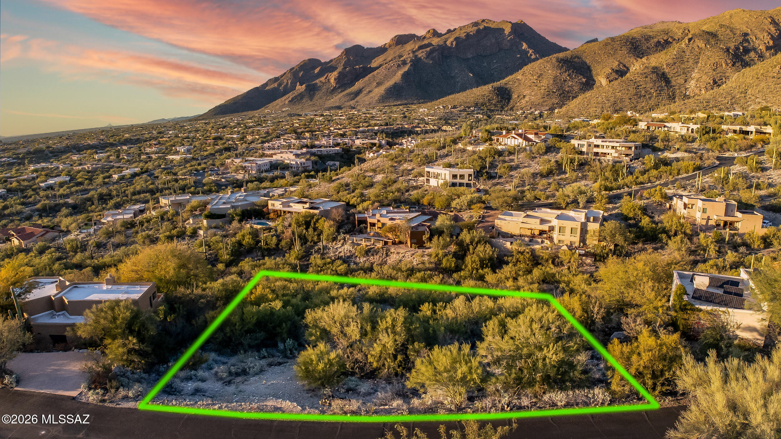Build your dream home today! Perched within the prestigious, guard-gated Sin Vacas community in the heart of the Catalina Foothills, this extraordinary homesite offers a rare opportunity to live where the mountains feel close enough to touch. Backdropped by sweeping, unobstructed views of the Catalina Mountains, the setting delivers daily sunrises, glowing desert light, and unforgettable sunset skies that define luxury desert living. Sin Vacas is known for its serene, private atmosphere and strong sense of community. An intimate enclave where nature, architecture, and lifestyle coexist seamlessly. With 24-hour manned security, residents enjoy peace of mind alongside immediate access to upscale shopping, award-winning restaurants, scenic hiking and biking trails, and the cultural energy of downtown Tucson, all just minutes away.

Preliminary architectural plans are easily available (ask for contacts), crafting a custom residence tailored to your vision. A trusted custom home builder can further refine every detail, from indoor-outdoor living spaces to view-framing design elements that fully embrace the surrounding landscape.

With utilities in place and a tranquil foothills backdrop, this is more than a homesite, it's an invitation to create a legacy property in one of Tucson's most sought-after luxury communities. Opportunities like this are rare. The setting is timeless. The lifestyle is exceptional.