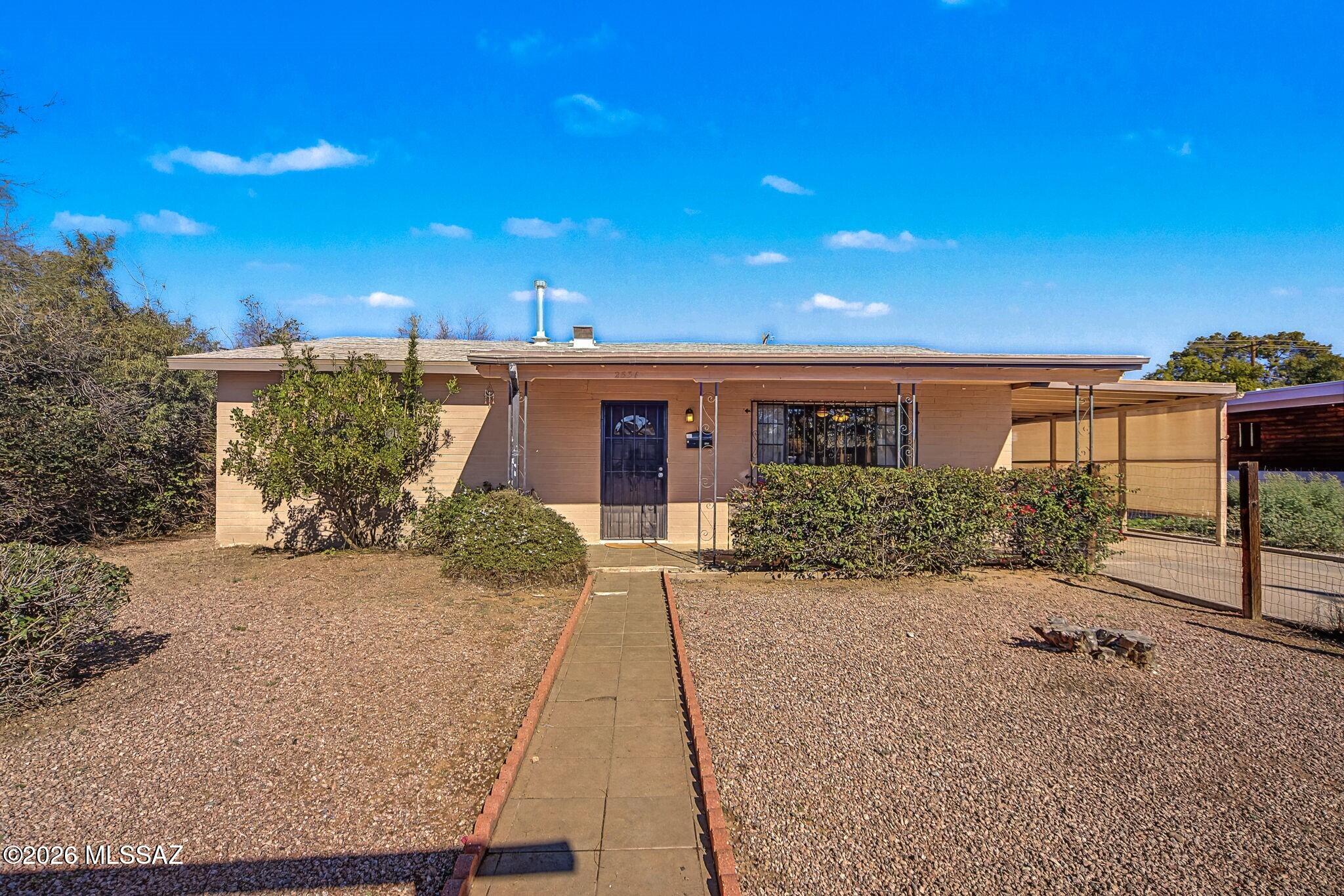 *Owner/Agent* Fantastic opportunity in an established central neighborhood. Enter through the fenced front yard to the covered porch. Inside this spacious home features a flowing floor plan and a bonus room they stretches the width of the home. Natural light filters through the living areas, enhancing the home's welcoming atmosphere. Three bedrooms, two bathrooms, a laundry room. Freshly painted throughout, and move in ready. The north facing backyard is ideal for year round, and enjoyment. This is more than a home.
