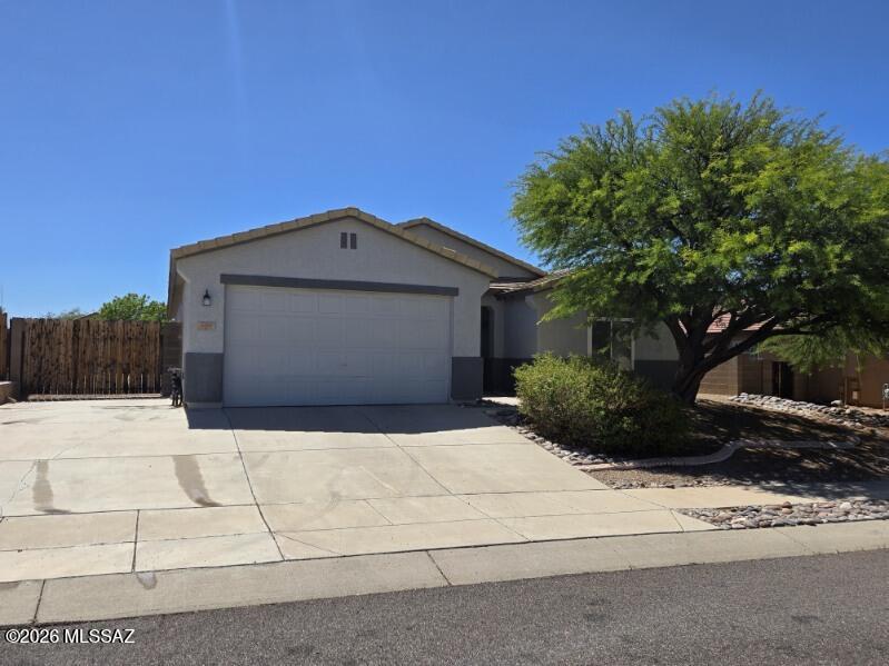 Welcome to this spacious, beautifully designed contemporary home in the desirable Santa Rita Ranch neighborhood. The home features a wide-open, tiled main living space perfect for gathering with family and friends. Notable upgrades include new wood flooring replacing the carpeting throughout the home and freshly painted kitchen cabinetry complemented by light-colored Corian countertops and a breakfast bar. The primary suite offers wood flooring and an expansive walk-in closet, while the primary bath features a double vanity, a tub-shower combo, and ample storage. Additional improvements include all-new dual-pane, vinyl, double-hung windows and a new HVAC system installed in July 2024. The large backyard provides a blank slate for you to make it your own space.