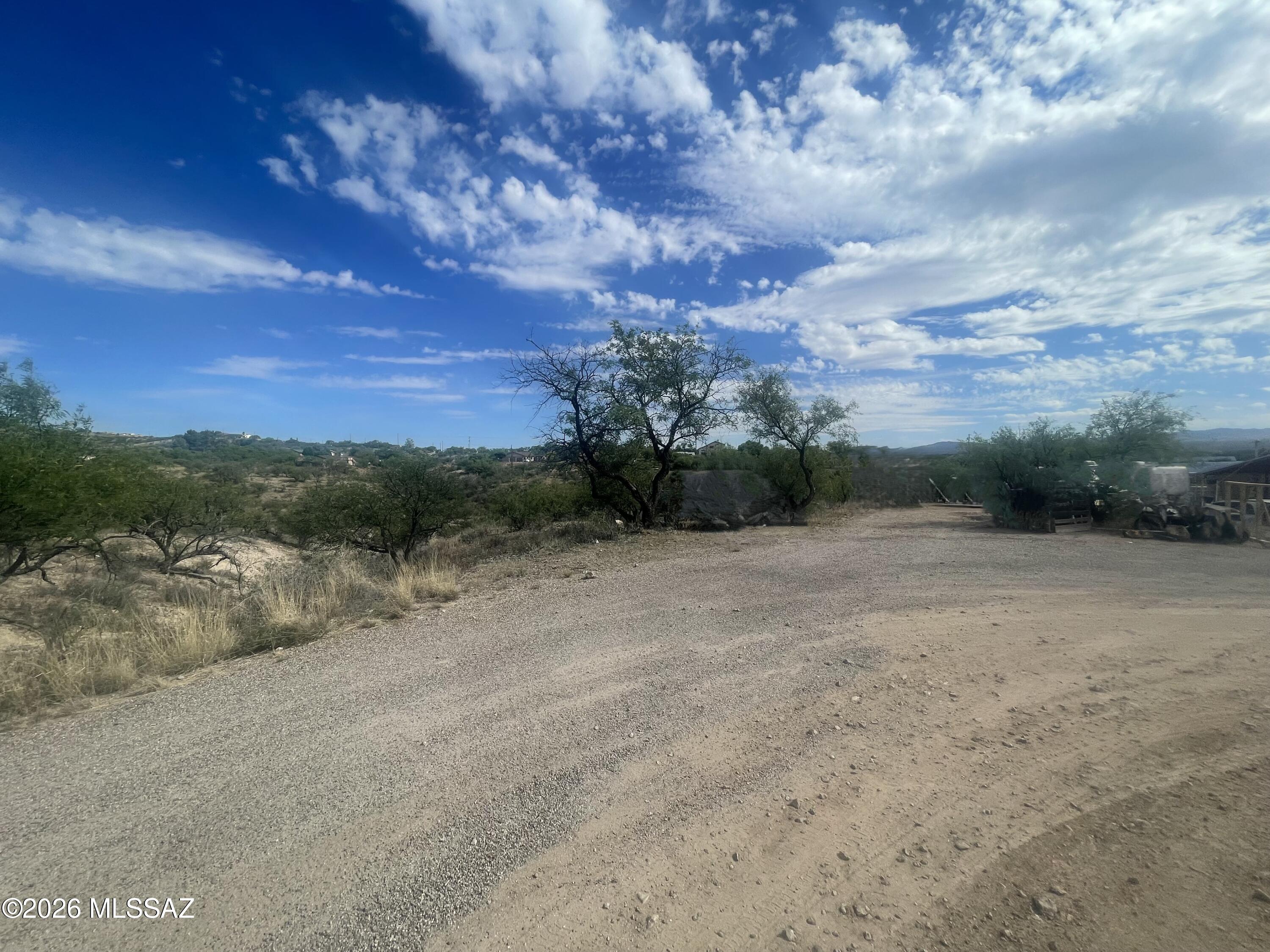 Flat lot with views!   Perfect for building your next home.   Electric and water connections are nearby.  Centrally located and close to shopping areas.   Easy access to the freeway.