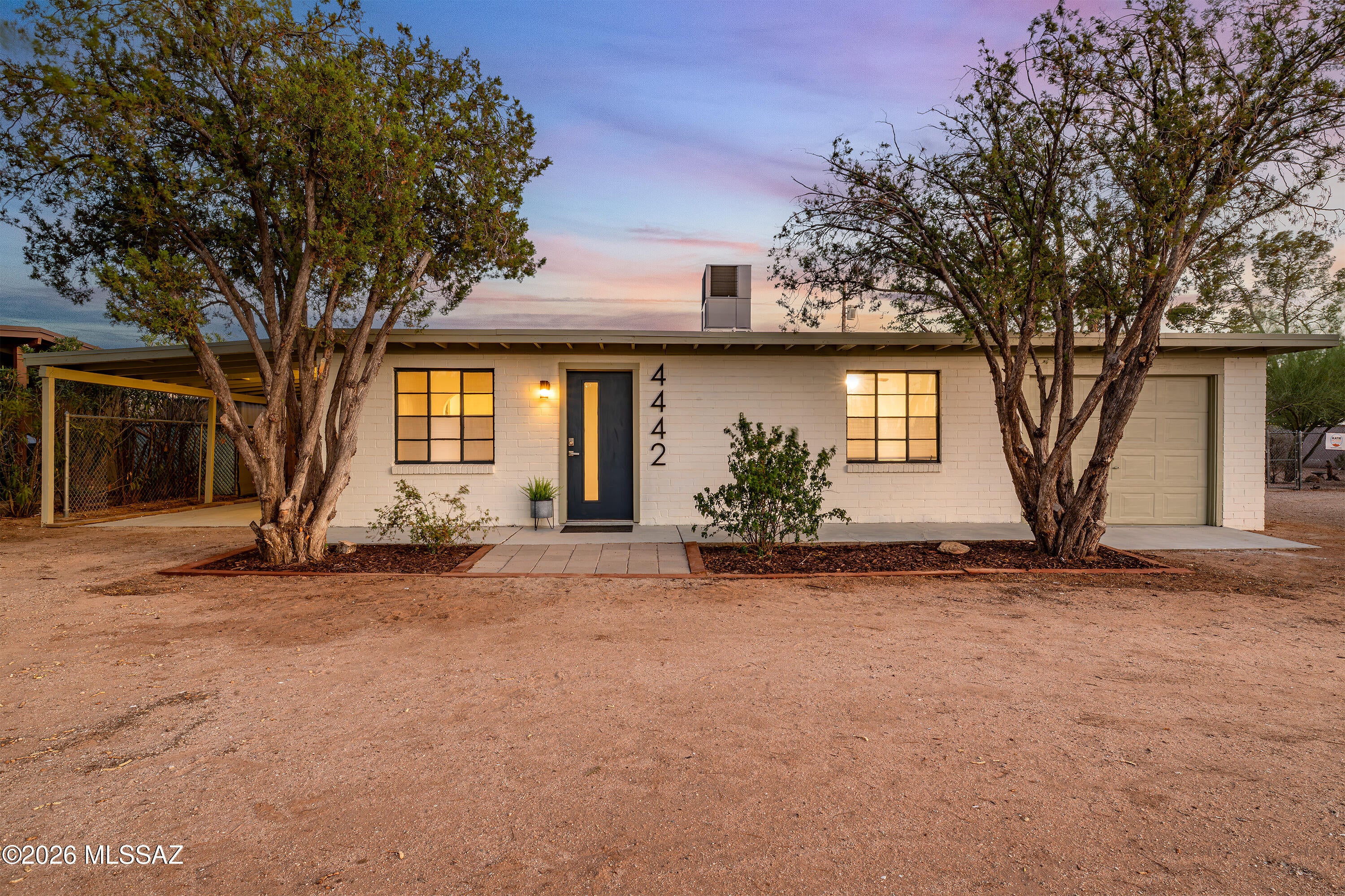 Welcome home to this charming bungalow situated on a spacious R2-zoned lot, on a quiet street, in the heart of a well-established midtown neighborhood. Move-in ready and full of character, this beautifully updated 2-bedroom, 1-bath home seamlessly blends timeless charm with modern upgrades, making it an exceptional opportunity for homeowners and investors alike.
Extensively renovated in 2026, the home features a stunning new kitchen, a beautifully remodeled bathroom with a soaking tub, luxury vinyl plank flooring throughout, fresh interior and exterior paint, updated lighting, and ceiling fans throughout. Major system improvements include a new energy-efficient heat pump, a replaced sewer line, and all-new gas lines, providing peace of mind for years to come. (See the complete list of improvements in the Documents tab.)
The spacious backyard offers endless possibilities for entertaining, gardening, or future expansion and is complemented by a newly added rear porch. Additional highlights include a dedicated laundry room with washer and dryer hookups, a one-car carport, and a one-car garage.
Ideally located within walking distance of John B. Wright Elementary School and just minutes from shopping, dining, Tucson Medical Center (TMC), The Loop, parks, and everyday conveniences, this property combines extensive updates, a desirable midtown location, and the flexibility of an oversized R2-zoned lot with potential for future development, delivering outstanding value and versatility.