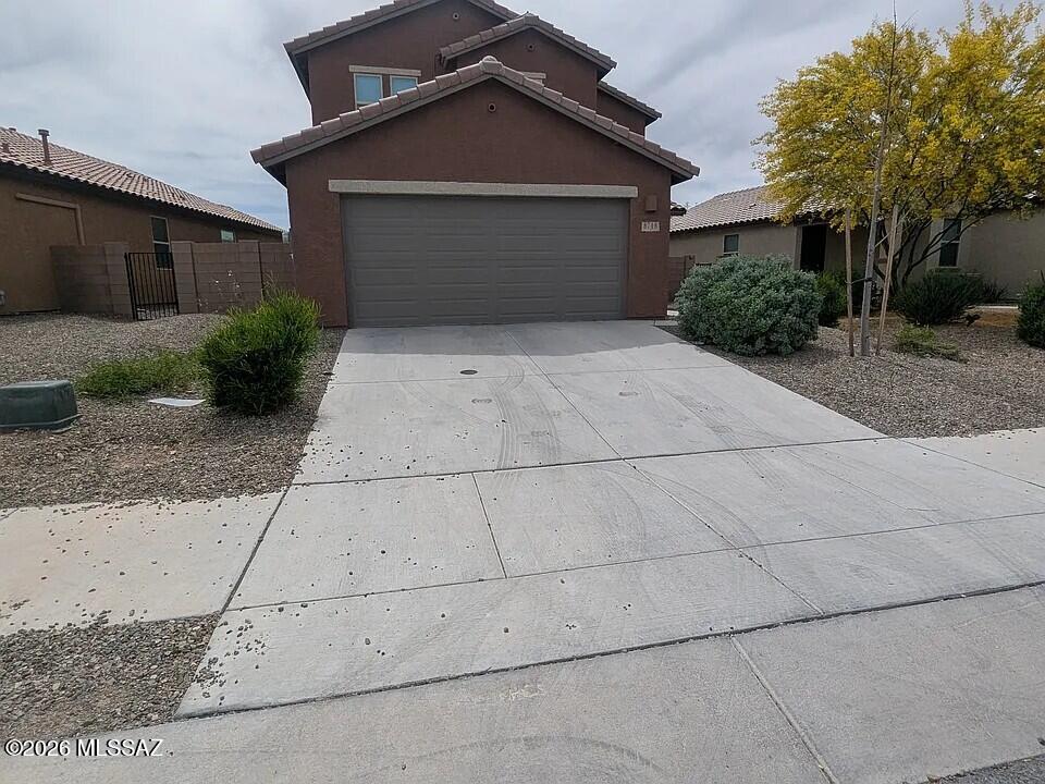 Great home on the southeast side of town.  3 bedroom, 2.5 bath-3 bedrooms, 2 full bath with a loft upstairs and den downstairs with a half bath.  Living/dining areas, large kitchen with double oven, cooktop, dishwasher, refrigerator, pantry and breakfast bar.  Laundry room with hookups, 2 car garage, community park near by the children's play area.  Solar panels-tenant will  reimburse landlord $150 for the solar panel usage.  Pets allowed with $25 per month in pet rent and $5 per month for each additional pet.
