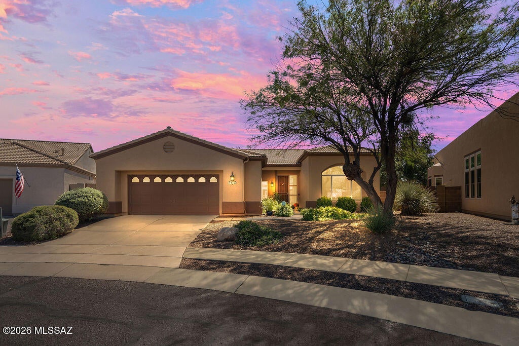 A rare opportunity in one of Northeast Tucson's hidden gems! Set within an intimate gated community where homes seldom become available, this beautifully inviting 3-bedroom, 2-bath home offers soaring ceilings, abundant natural light and an effortless open-concept layout. The bright kitchen opens seamlessly to the living and dining spaces, perfect for both everyday living and entertaining. Enjoy stylish, easy-care flooring throughout with no carpet. The spacious primary suite features a walk-in closet and private bath, while the backyard offers a wonderful setting for outdoor dining, entertaining and relaxing under the Arizona sky. Private, bright and beautifully located--this one is special.